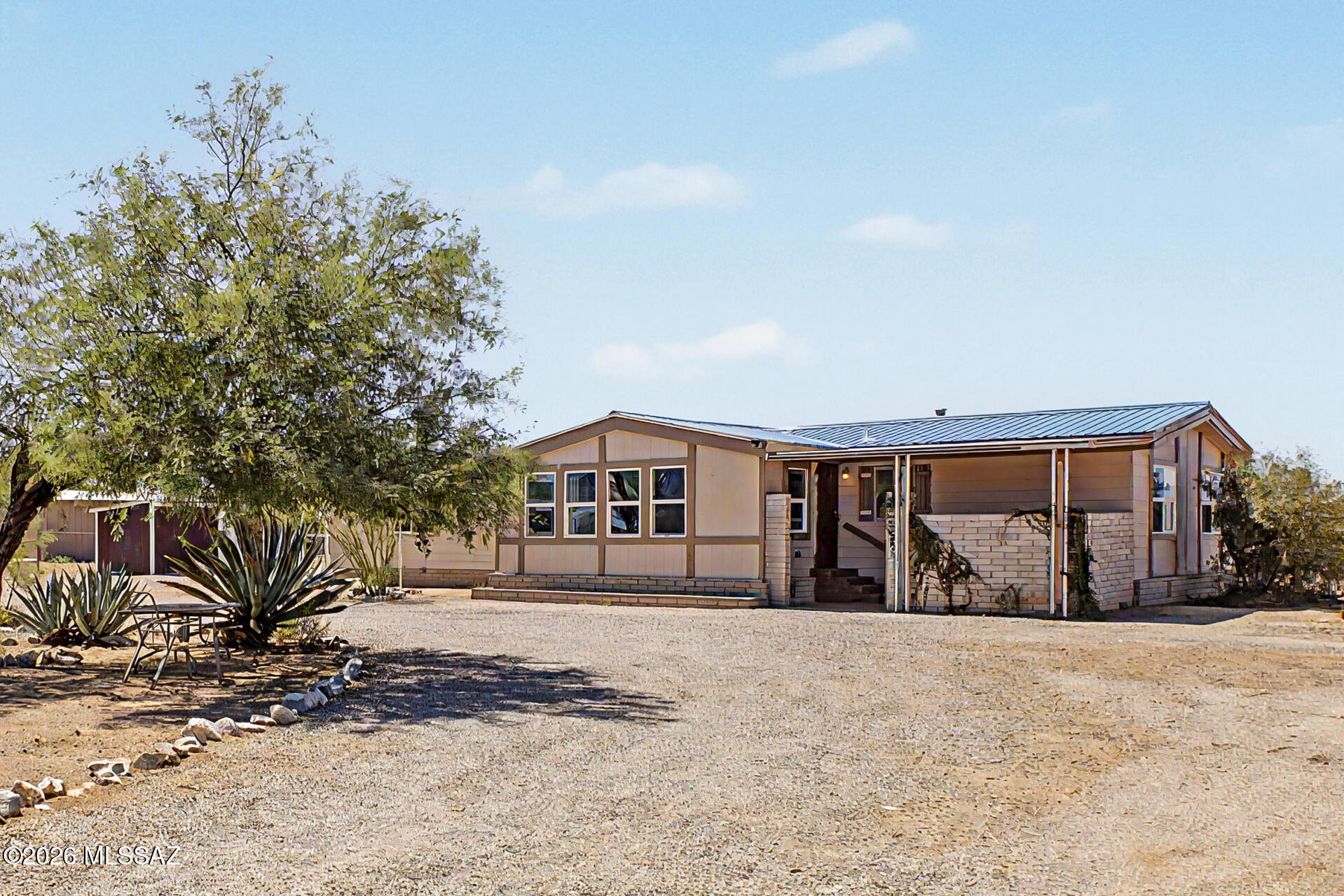 Welcome to Tierra Bonita on Tucson's Southwest side, near Kinney and Bopp Rd. This 3 bedroom, 2 bathroom home offers 1,994 sq ft on a large corner lot tucked into a quiet cul-de-sac with paved streets. The split bedroom floor plan features a living room, family room, new flooring, and plenty of flexible space for storage, hobbies, or a workshop. Outside, enjoy a durable metal roof, storage shed, room for RV parking, and the potential to easily add an RV hookup. A great blend of space, privacy, and functionality with room to make it your own.