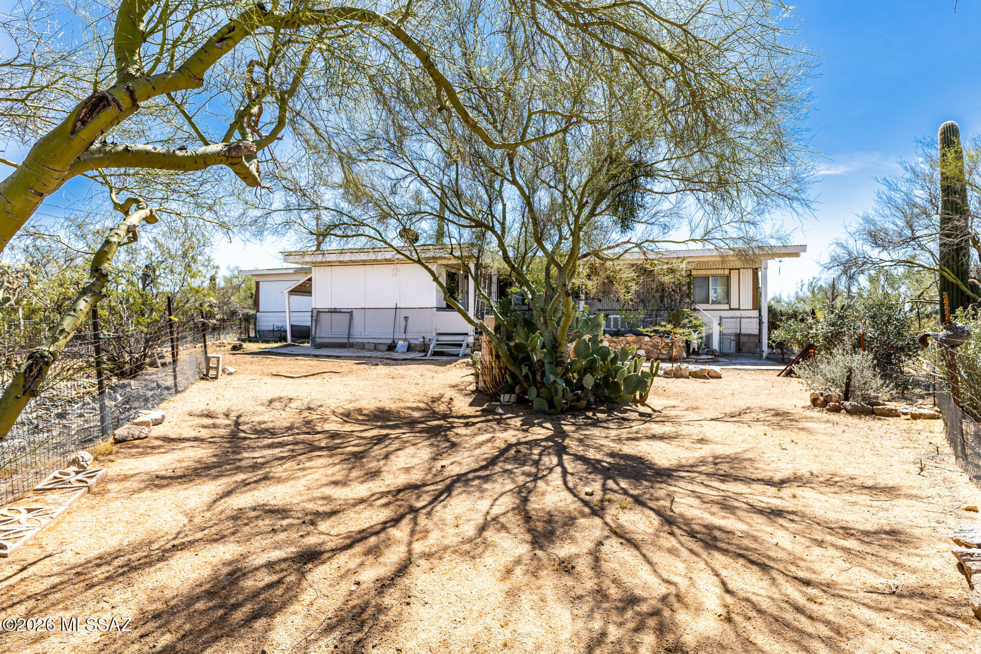 Opportunity awaits in this secluded country property at the end of the road. This 2 bed, 1 bath home offers a private setting with tons of potential, but will require updating and repairs  making this an ideal project for investors or buyers looking to create their own vision.
The property is well-equipped for horse lovers and livestock, featuring a barn type structure, and a fully fenced 2-acre parcel. There's plenty of space for animals, off-road vehicles, and future improvement.