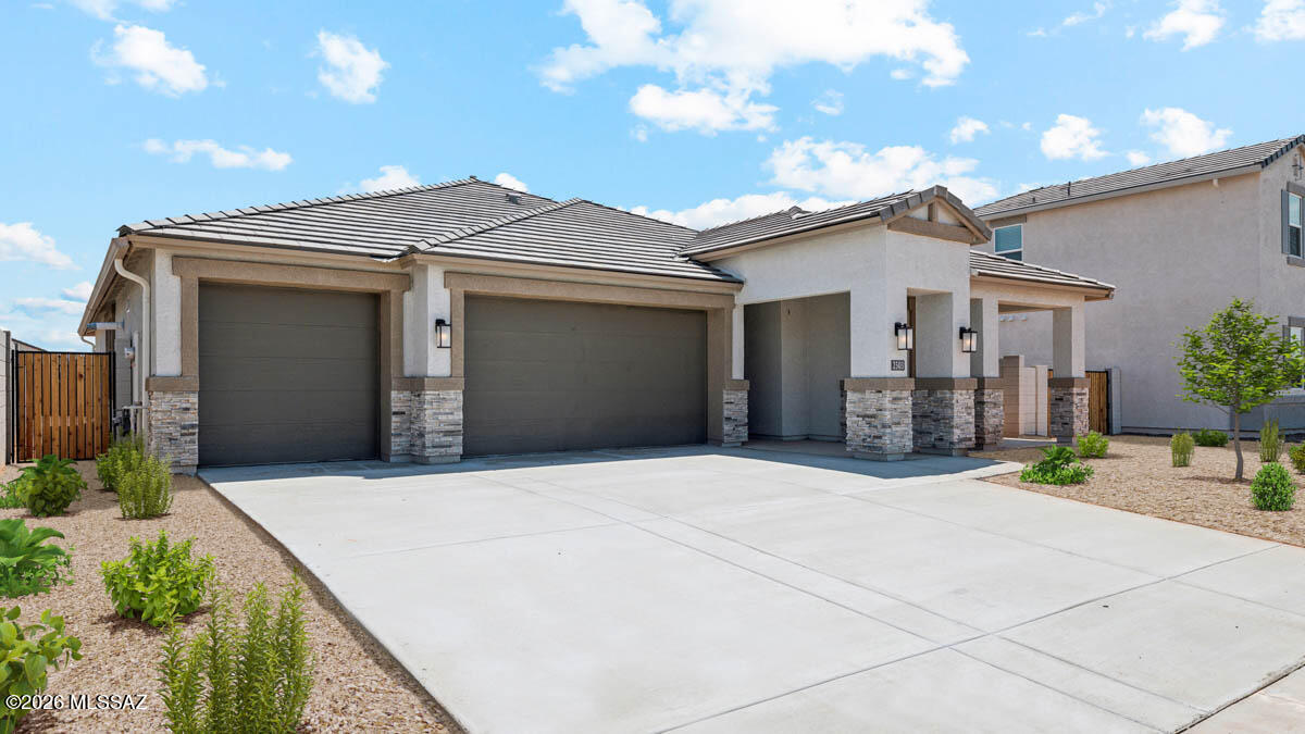 Welcome to your dream home in the desirable Saguaro Bloom community! This beautifully designed single-story home offers 5 generously sized bedrooms and 3 full bathrooms, perfect for families or those seeking extra space for guests or a home office. The open concept split floorplan features a bright and airy great room that seamlessly connects to the modern kitchen, complete with quartz countertops, stainless steel appliances, a large kitchen island and walk in pantry. Includes a three-car garage and is our most energy efficient home featuring spray foam insulation and is zero energy ready! Don't miss your chance to tour this amazing home!