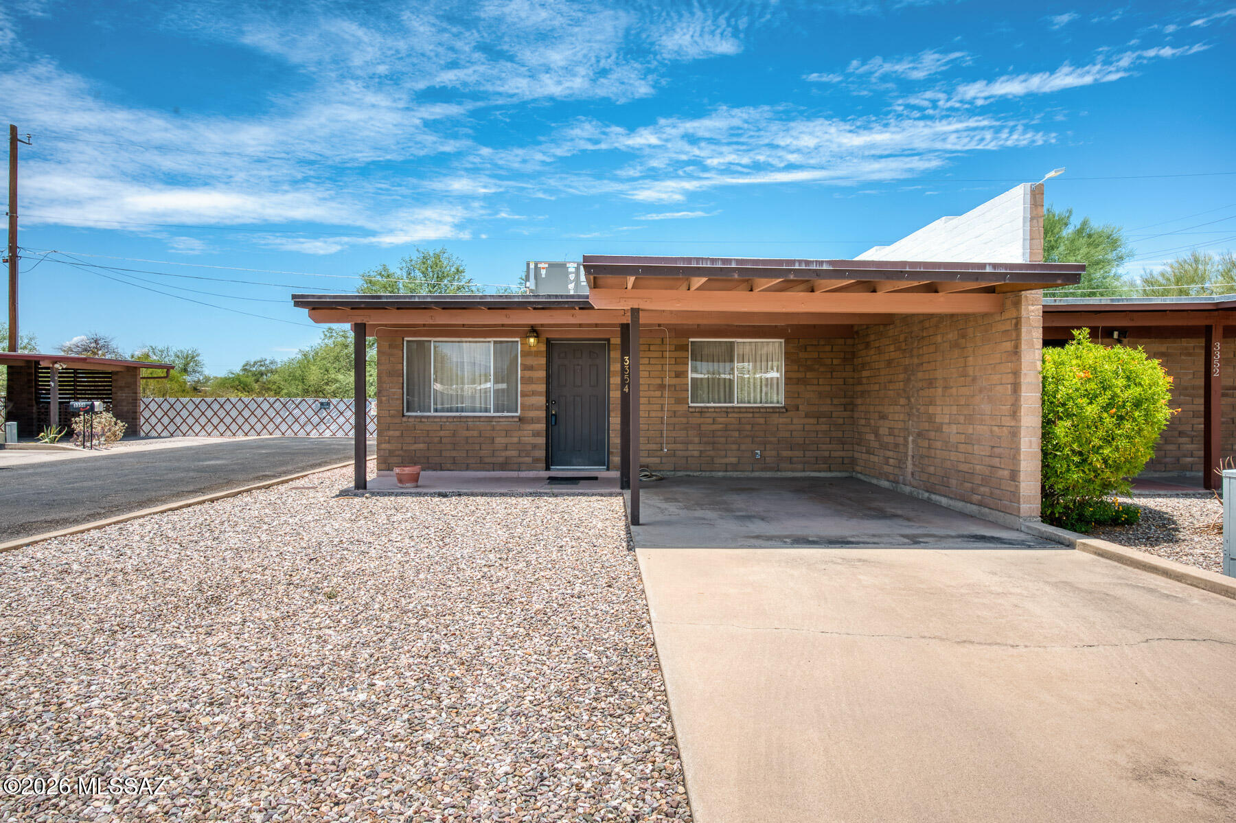 Well-maintained 2-bedroom, 1-bath townhouse in a convenient Tucson location. Ideally situated near the Tucson Bike Loop, Banner Hospital, and the University of Arizona, offering easy access to recreation, healthcare, and campus amenities. This comfortable home features a practical layout, a private small patio perfect for relaxing outdoors, and a 1-car carport for covered parking. A great option for first-time buyers, students, healthcare professionals, or investors seeking low-maintenance living in a desirable area.