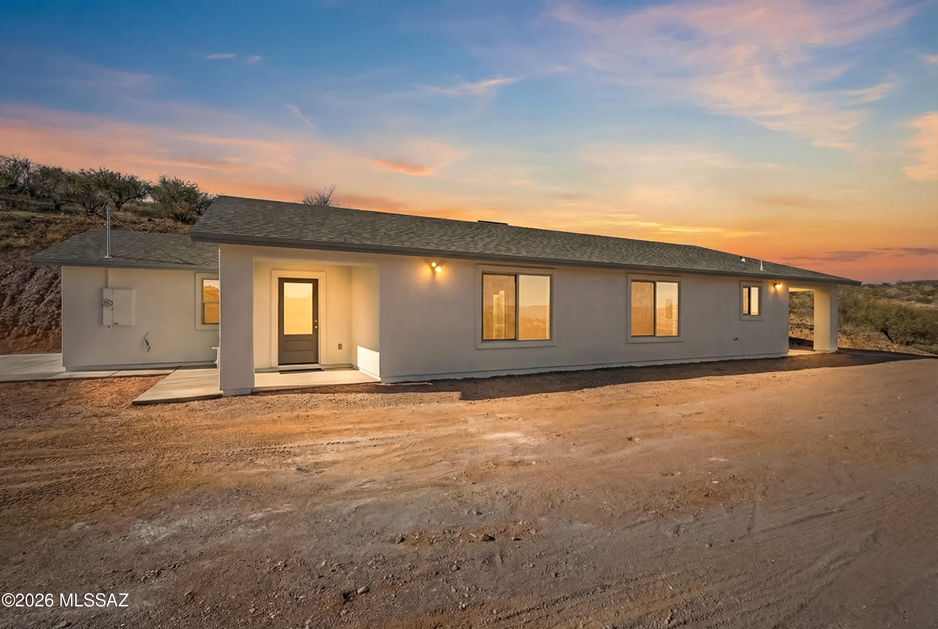 Perched on a 0.57 acre lot with breathtaking views, this brand-new construction home offers the perfect blend of modern design and wide-open space. This 1,796 sqft home features 3 spacious bedrooms, 2 beautifully appointed bathrooms, designed with comfort and functionality in mind. The open-concept living area creates a seamless flow between the kitchen, dining and great room-ideal for enjoying the surrounding scenery. The primary suite is a true retreat, complete with a massive walk-in closet and a thoughtfully designed en-suite bath that offers both privacy & style. With elevated positioning, expansive outdoor potential, and quality new construction throughout, this home delivers space, views, and modern living all in one exceptional package.