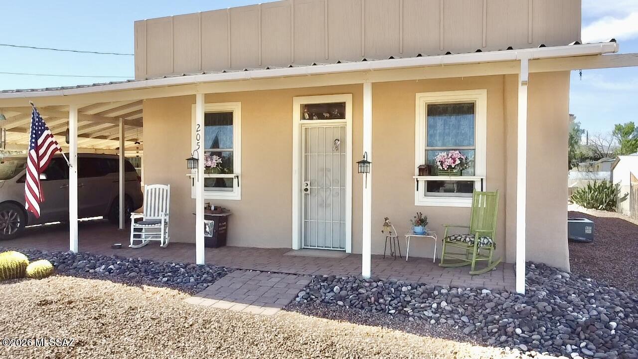 Welcome to this charming and versatile 2-bedroom, 1.25-bath home offering approximately 1,500 square feet of comfortable living space. The main residence spans 1,200 square feet and is complemented by an additional ~300 square foot attached, fully heated and cooled bonus room--perfect for a third bedroom, home office, workshop, craft studio, or hobby space.

Situated on an extra-large lot, this property captures stunning mountain views and provides ample room to relax, entertain, or expand. Enjoy your morning coffee from the inviting front porch, thoughtfully positioned to take full advantage of the scenic surroundings. Out back, a spacious porch creates the ideal setting for grilling and gathering with friends and family. An Arizona Room provides and enclosed area for relaxing. This home is packed with valuable upgrades and features, including owned solar for energy efficiency, new Andersen windows, and a beautifully manicured yard that enhances curb appeal. The property also includes a dedicated RV pad with full electric, water, and sewer hookups--perfect for travelers or hosting guests.

Located within walking distance to Historic Allen Street, you'll enjoy convenient access to local shops, dining, and entertainment while still savoring the peace and privacy of your own retreat.

A rare combination of flexibility, location, and lifestyle--this home is ready to meet your needs.