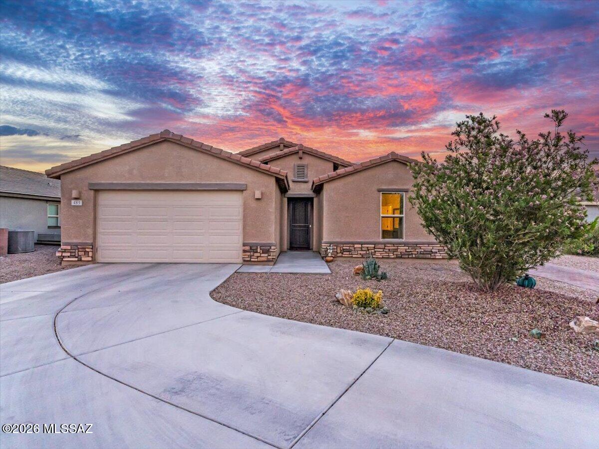 Some homes just have that feeling the moment you pull up, and this one delivers before you even walk through the door. Nestled in the gated community of Arbor at Madera Highlands, this 4 bedroom, 3 bath, 2,426 sq ft home sits on a premium elevated lot with sweeping views and no rear neighbors.

Loaded with over $93K in builder upgrades + $30K in seller upgrades. The open concept layout is everything. The kitchen speaks for itself. The primary bath feels like a spa you never have to leave. The 4-foot extended 3-car tandem garage with epoxy floors and a water softener is perfect for anyone who needs room for the toys, the tools, and everything in between.

Step outside to a built-in gazebo, gas fire pit, and finished landscaping made for Arizona evenings. Extra paver parking sits alongside the home and every detail has been thought of so you don't have to.

Newer construction living at its absolute best. No waiting, no upgrading, no compromising.