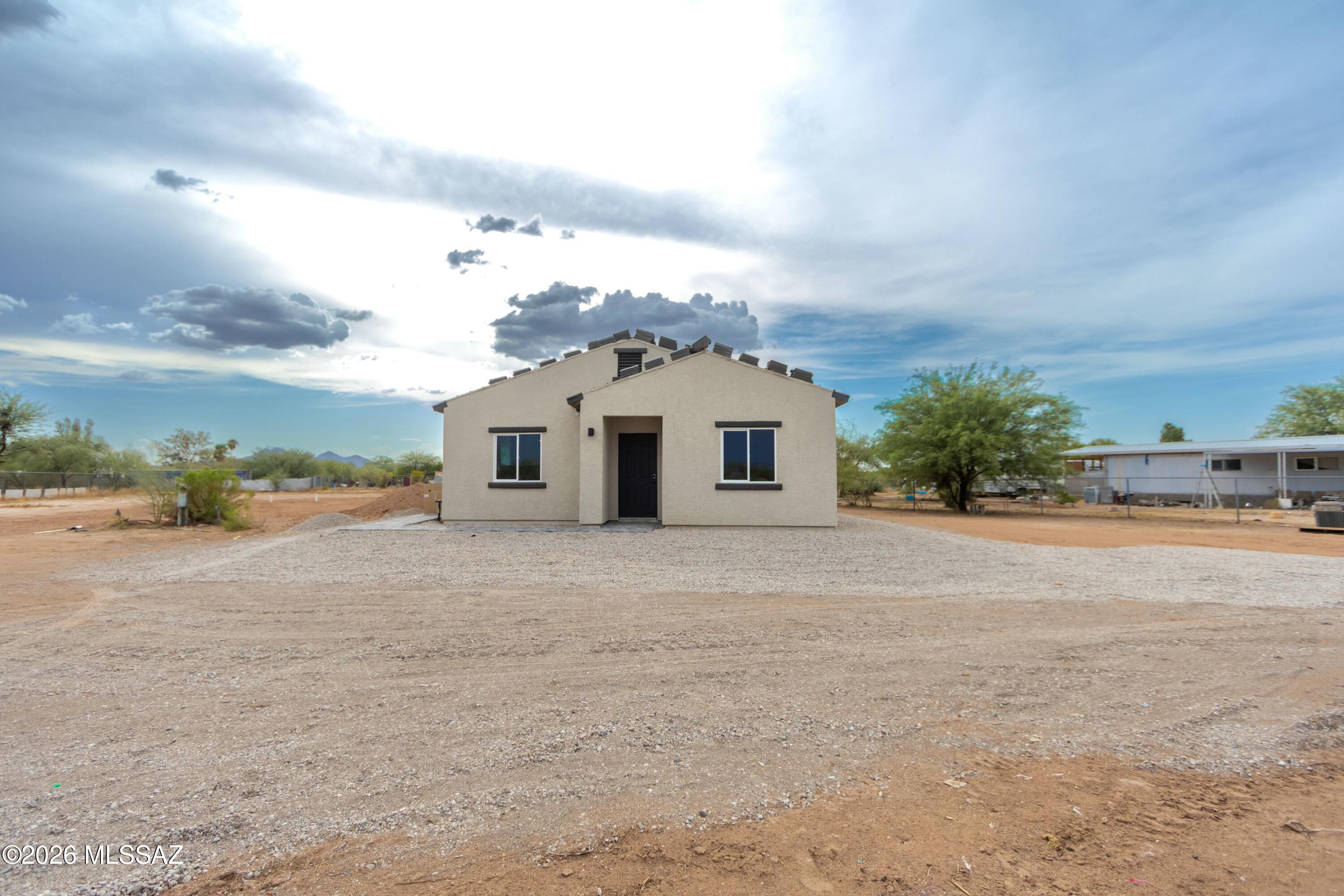 Beautiful new construction home on a spacious 1-acre lot in Marana with no HOA! Enjoy the freedom of country living with room for horses, RVs, and all your toys. This thoughtfully designed home offers modern finishes, an open-concept layout, and the perfect blend of privacy and convenience with easy access to shopping, dining, and I-10.