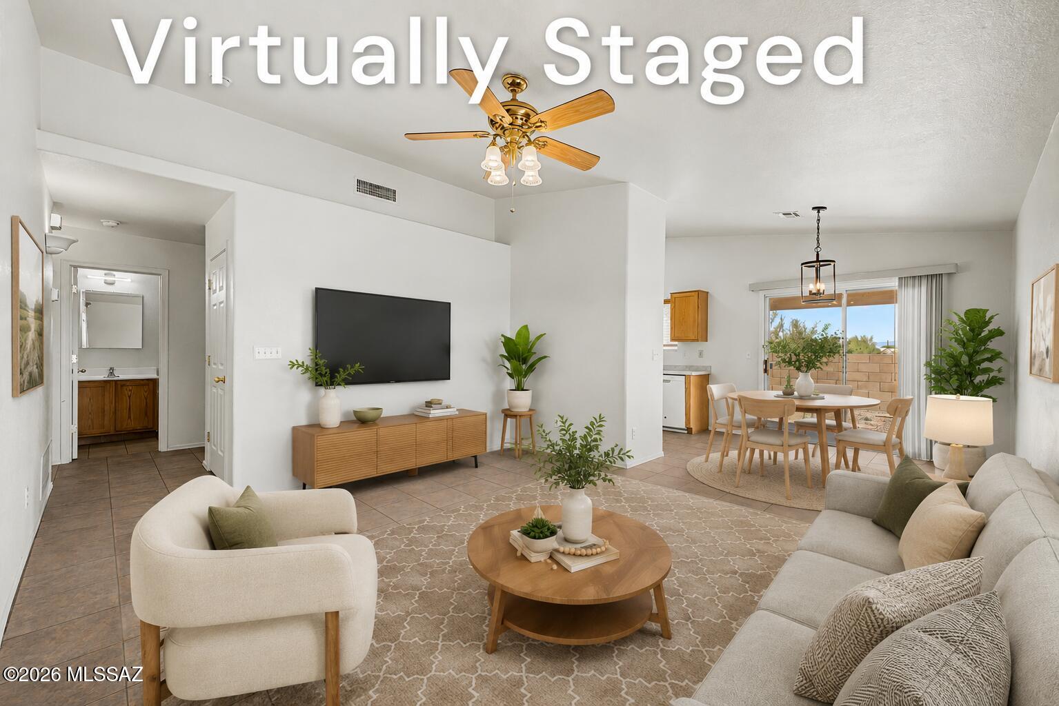 Welcome home to this charming corner lot residence with a 2 car garage and beautiful Santa Catalina Mountain views in the lovely Ironwood neighborhood. Offering 1,176 square feet of comfortable living space, this inviting home features 3 bedrooms, 2 bathrooms, soaring vaulted ceilings, and a bright, open layout designed for everyday living. The well-appointed kitchen comes complete with all appliances, including a gas range, microwave, dishwasher, and side-by-side refrigerator, making move-in easy. The spacious primary suite provides a private en suite bathroom for added comfort and convenience. Step outside to a generous backyard that backs to open space, where you can relax beneath the covered patio while taking in the picturesque mountain views. Conveniently located with easy access to Interstate 10, this home is just minutes from schools, parks, shopping, dining, and a variety of recreation opportunities. This is a wonderful opportunity to enjoy comfortable living in a fantastic location.
