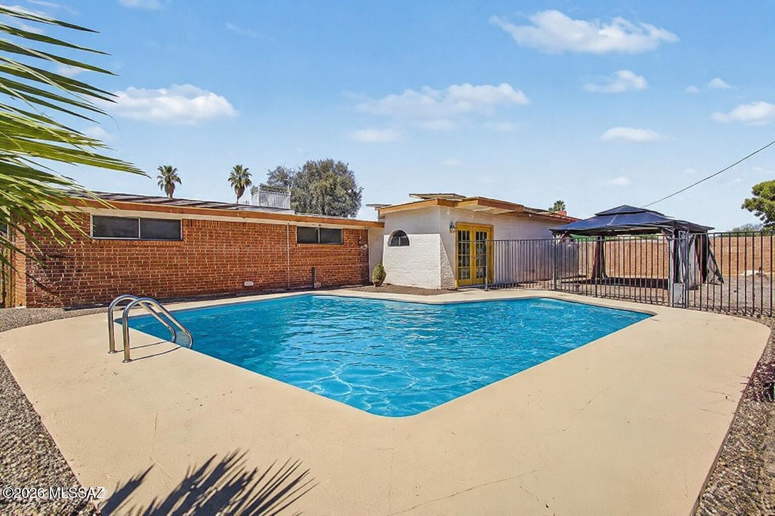 Starting at 339k! Move-in ready and packed with value! This spacious 4-bedroom, 2-bath home offers the perfect blend of comfort and efficiency. Enjoy Arizona living with your own private backyard oasis featuring a sparkling pool--ideal for relaxing or entertaining year-round. Inside, you'll find a functional floor plan with generous living spaces, plenty of natural light, and room for the whole family. A major bonus is the fully paid-off solar system, providing long-term energy savings with no solar payment. Conveniently located near parks, shopping, dining, and schools, this home is one you won't want to miss. Schedule your showing today!