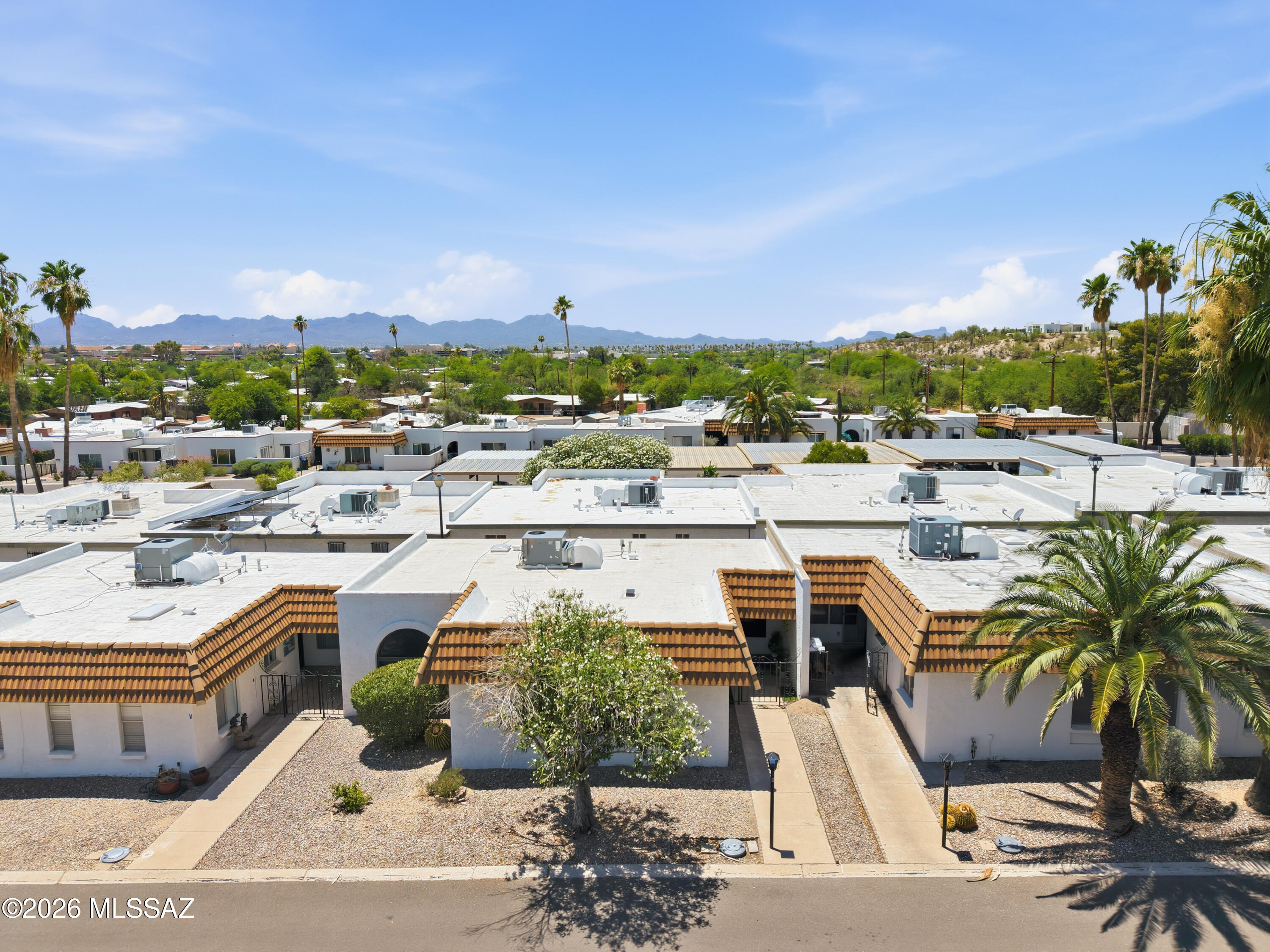 This move-in-ready, 2-bedroom, 2-bath townhome has two covered parking spaces and a private storage unit. It's located in the NW of Tucson. This amazing remodeled property has been updated with cabinets, granite countertops, stainless-steel appliances, and bathrooms featuring granite, tiled showers, and executive-height cabinets. It has an upgraded HVAC system, a newer water heater, and an updated roof and lighting. 
Tile flooring throughout, fresh interior and exterior paint, and security screens on all windows. Refrigerator, washer, and dryer are included. In this community, it backs up to the river path, which gives you access to the 135-mile loop, a sparkling pool, spa, and BBQ area. The HOA covers: sewer, water, trash, and street maintenance. The community is pet and rental-friendly.