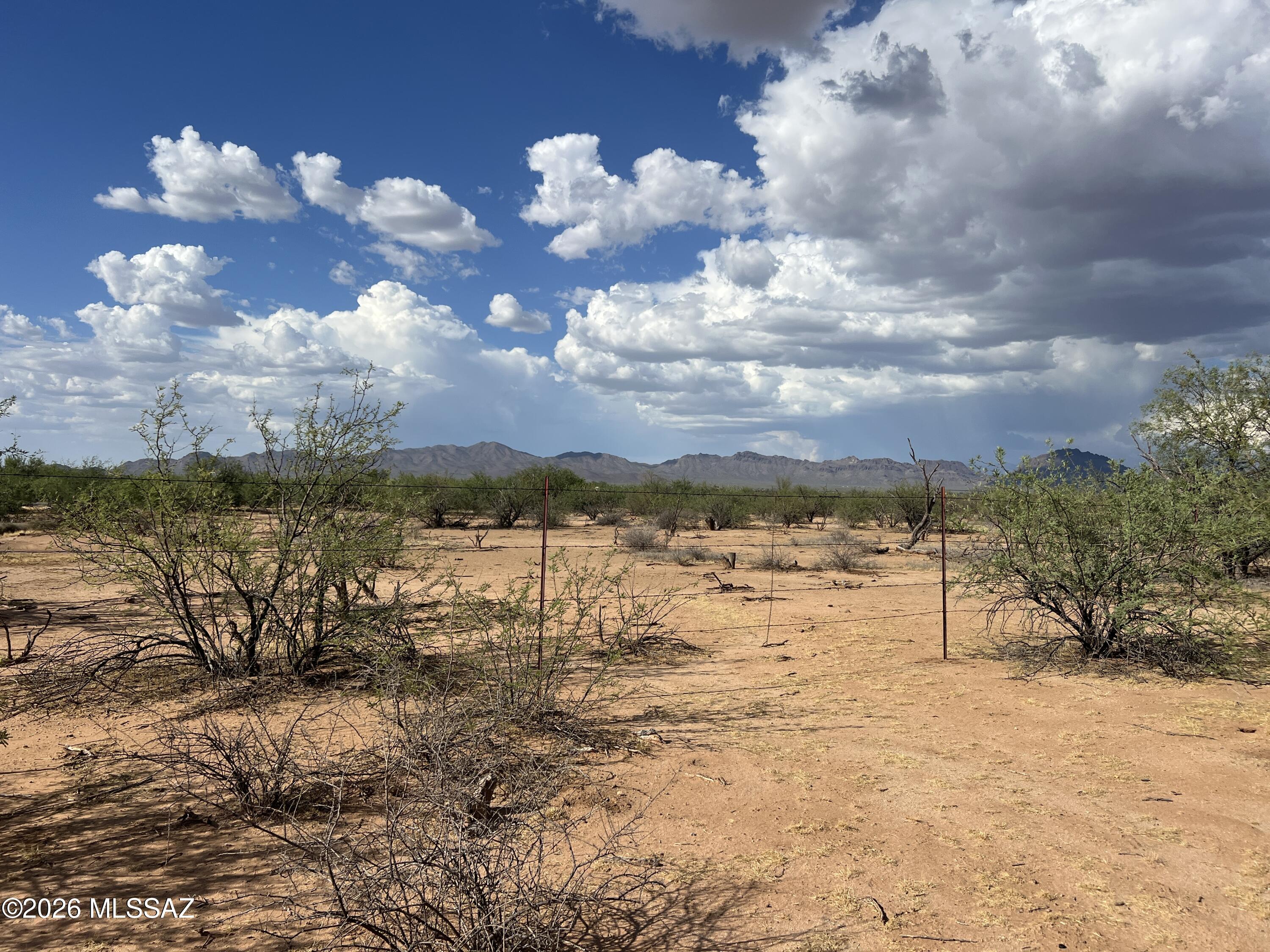 Two 40 acre parcel - 80 acres total - one has  3 septic tanks, electric and private well on property, flat topography. Ready for you to bring your new manufactured home or build your dream home with plenty of land for privacy. RH zoning allows for multiple uses.  No HOA!!!
Beautiful Arizona desert.