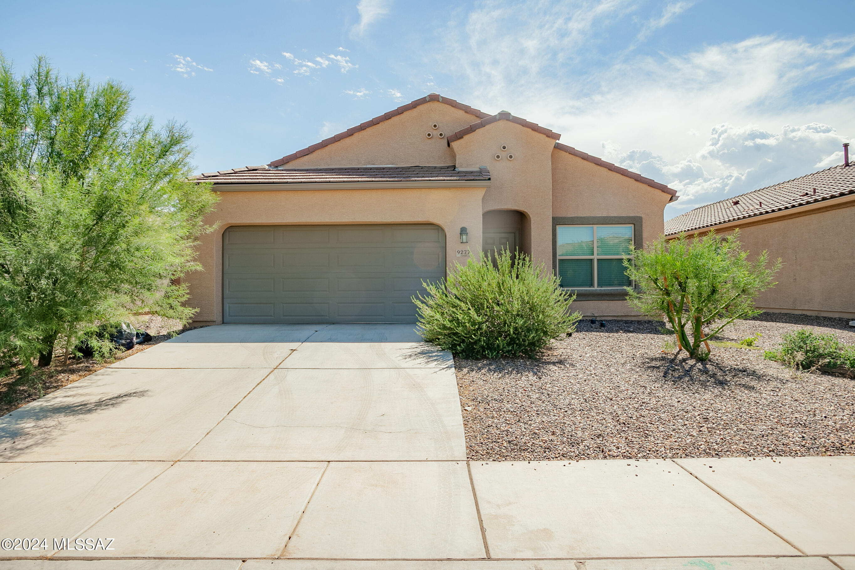 2022 NEW BUILD 5 BEDS 3 FULL BATHS double car garage single story home in desirable Saguaro Bloom, just 6 mins from freeway & Premium Outlet Mall, near by schools, grocery stores, entertainments, shopping & businesses. Built August 2022, the house is in excellent condition, like new! Wonderful Van Buren model w/great flow, no space wasted. Very bright & open concept w/tall ceiling & lots of natural light. Huge laundry room. So many closets, shelves & storage throughout the house. Great sized kitchen w/big island features beautiful contrast between granite countertop, dark espresso cabinets & SS appliances. Nice landscaped front & back yard w/covered patio, high block fence, gravel rocks & plants. Community offers multiple pools, parks, lap pool, hot tubs, gym, club house, splashpad.