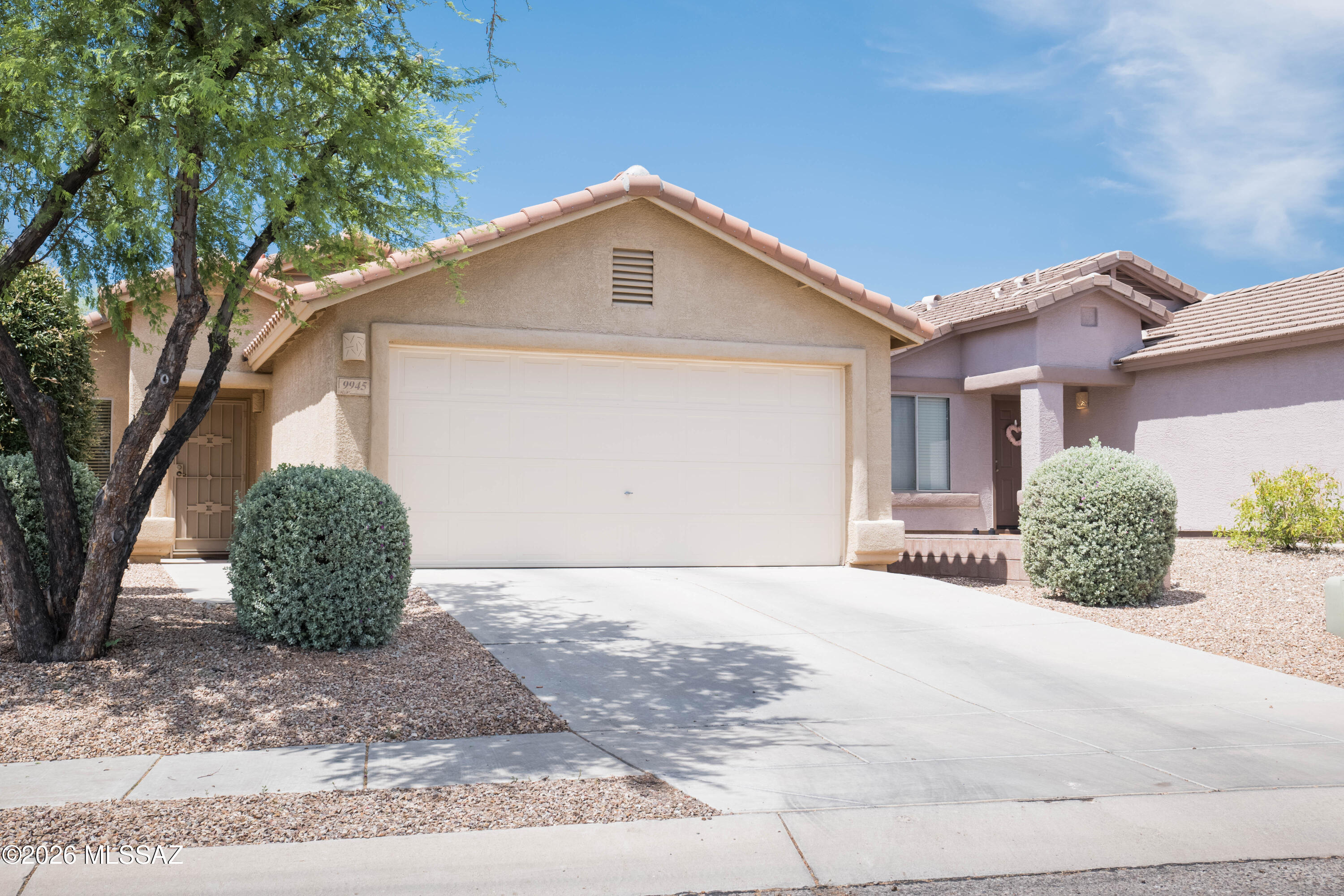 Lovely 1258 square foot home on the east side of Tucson that lives large. Enter into the separate living room then walk into the kitchen with an island and family room with a dining area. Down the hallway off the kitchen or living area you'll find the spacious primary bedroom with a wall of windows to add natural light and the primary bathroom, two guest bedrooms, the guest bathroom and a laundry room with an entrance into the 2 car garage. Then step out to the private block walled backyard with a covered patio and lawn area. This one owner home has taken amazing care including new roof (2 years ago) and new carpet installed in all 3 bedrooms. For the kids, there is a neighborhood park within walking distance to play basketball etc. maintained by the HOA. Home sweet home.