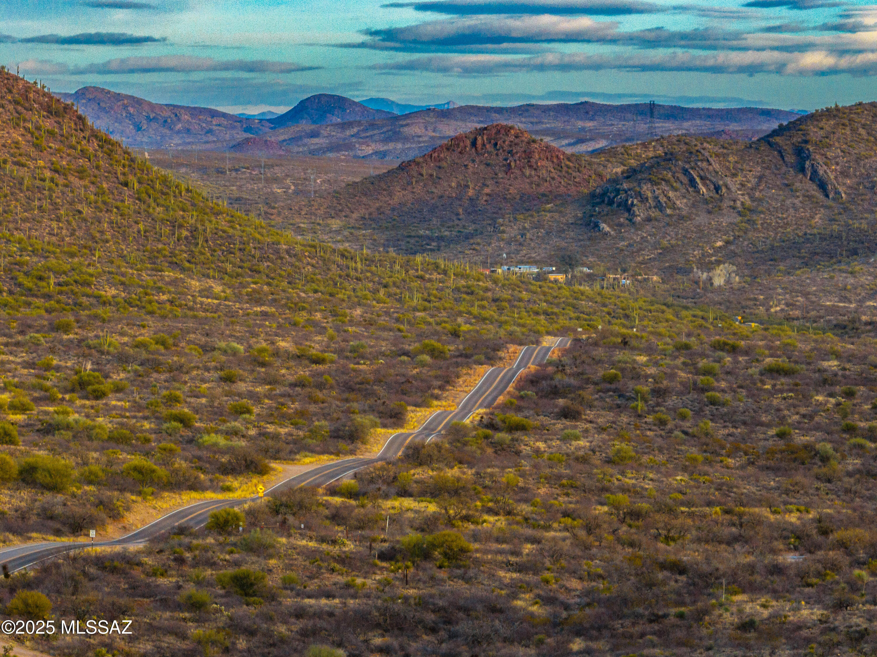 This expansive lot presents the perfect canvas for your dream home, offering panoramic valley views and stunning sunsets. With a septic tank, shared well, and electricity already on-site, the property is primed for development. You have the flexibility to build either a manufactured or site-built home, with no hillside restrictions to limit your plans. The lot also features a subtle cellular tower that generates income without compromising the incredible views. Additionally, it's an ideal property for horse lovers, providing ample space for equestrian activities. Create the home and lifestyle you've always wanted on this versatile and well-equipped property.