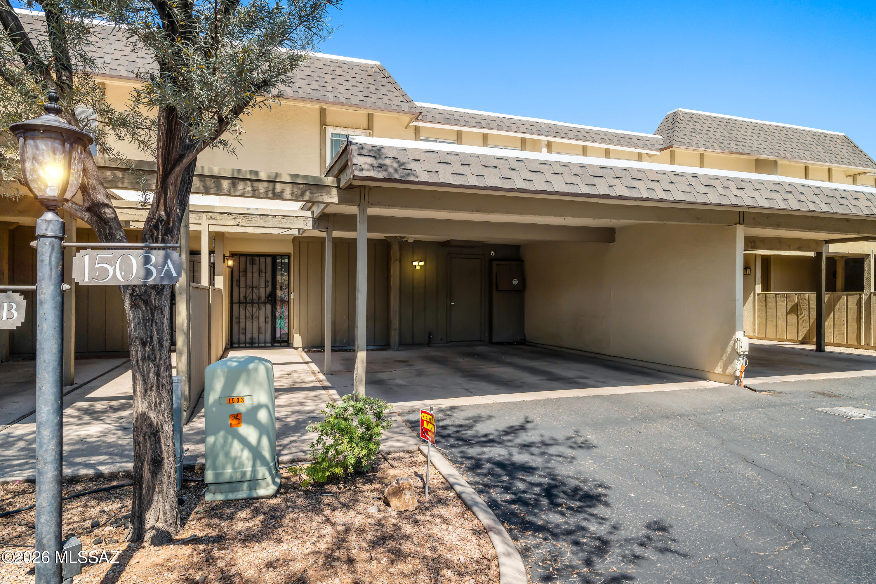 WOW! Check out this AMAZING centrally located townhome with 3 large bedrooms, 2 full bathrooms upstairs and 1/2 bath downstairs for guests. Over the past few years, the home has been updated to include granite counters & painted cabinets in the kitchen w/stainless appliances.  Updated lighting fixtures, ceiling fans, and bathrooms. Laundry room includes washer, dryer, and storage. Private back patio is fully fenced. This location is perfect! Close to shopping, schools and LESS than 3 mi to the University of AZ. The large carport is great for 2 cars w/plenty of guest parking onsite. The complex offers a sparkling community pool, basketball court, and a playground with open grass area. Don't let this one get away!