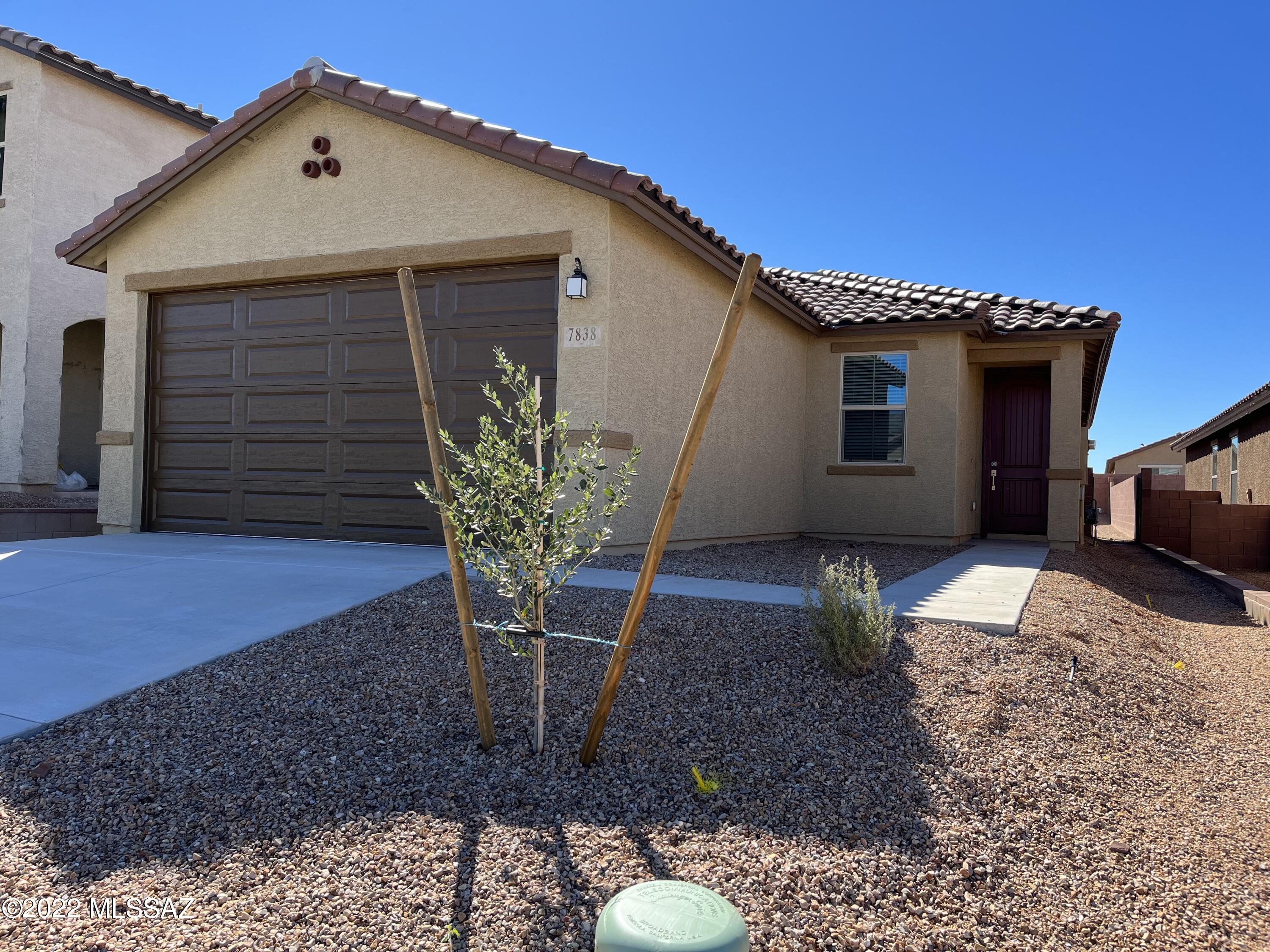 Welcome to the Beautiful Gated Community of Silver Ridge at Rocking K Ranch! Upgraded 3 bed plus den features 9' ceilings, slate gray stained cabinets, granite counters, stainless appliances, gas range, 18'' X 18'' tile floors, carpet in  bedrooms only, primary bath has oversized walk in shower and dual vanities. Home is 1 block from park, basketball and tennis courts, beautiful mountain views! Located 13 minutes to major grocery store, 20 minutes to UA tech Park and 26 minutes to Tucson Intl. Airport. Welcome Home!