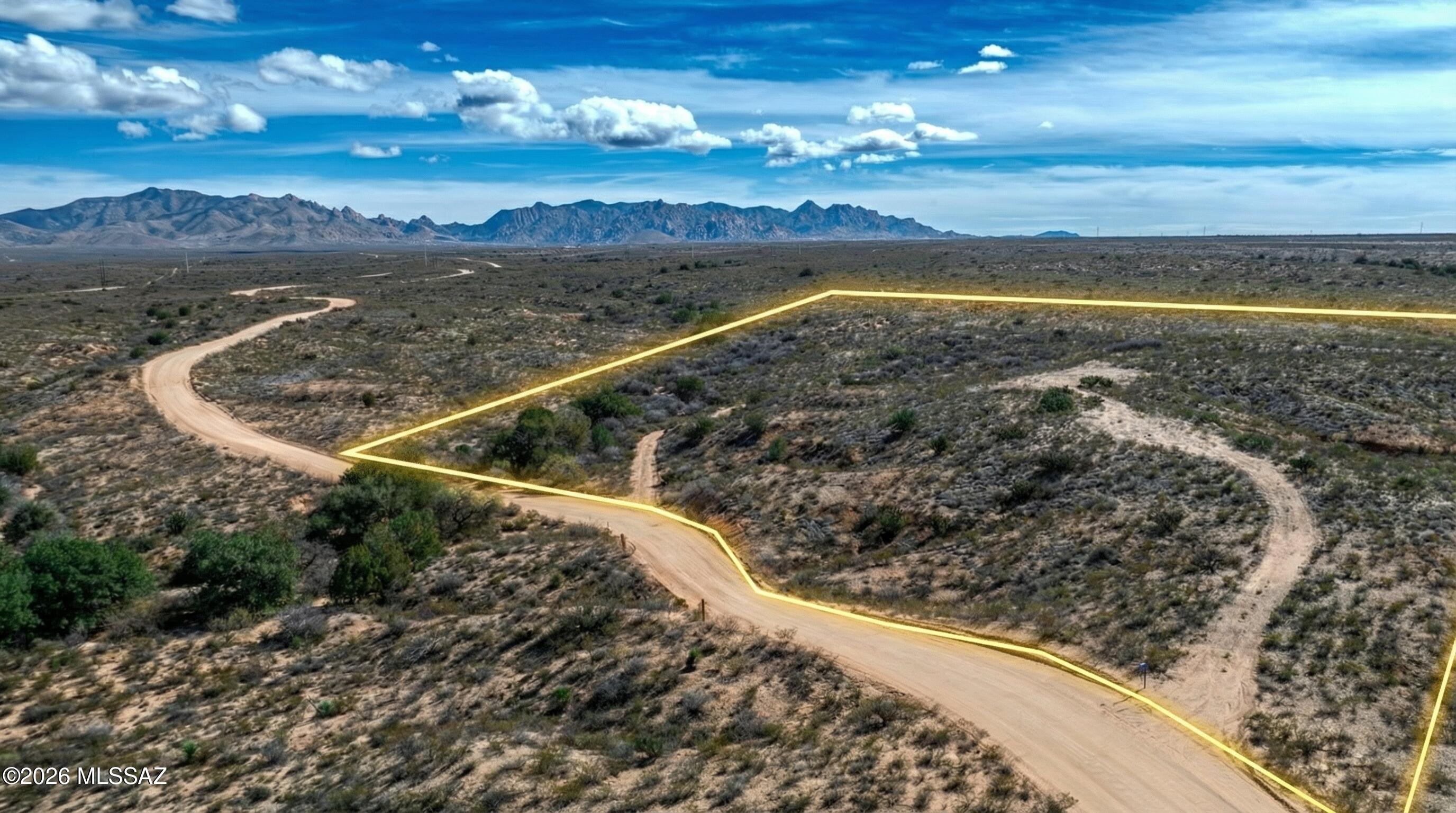 If you lived here you would be home now. This is a one of a kind 36 acre hilltop lot available with a new water well powered by SOLAR ENERGY. Located 2 miles in from the Sibyl gate, the location provides quick access to I-10 while still providing the rural lifestyle with 360 degree hilltop views people seek out in Dragoon Mountain Ranch. Includes a state of the art solar powered water well supplying 32 gallons a minute with a recently added 2500 gal. Water tank. So if you are looking to go off grid, this may be your opportunity. This home site is established on the high point of the property creating 360 views of the Cochise Stonghold, St. David, Benson and the Rincon Mountains. New well,New Water tank, New Solar with an option to expand service, close to the Sibyl Gate, all available now