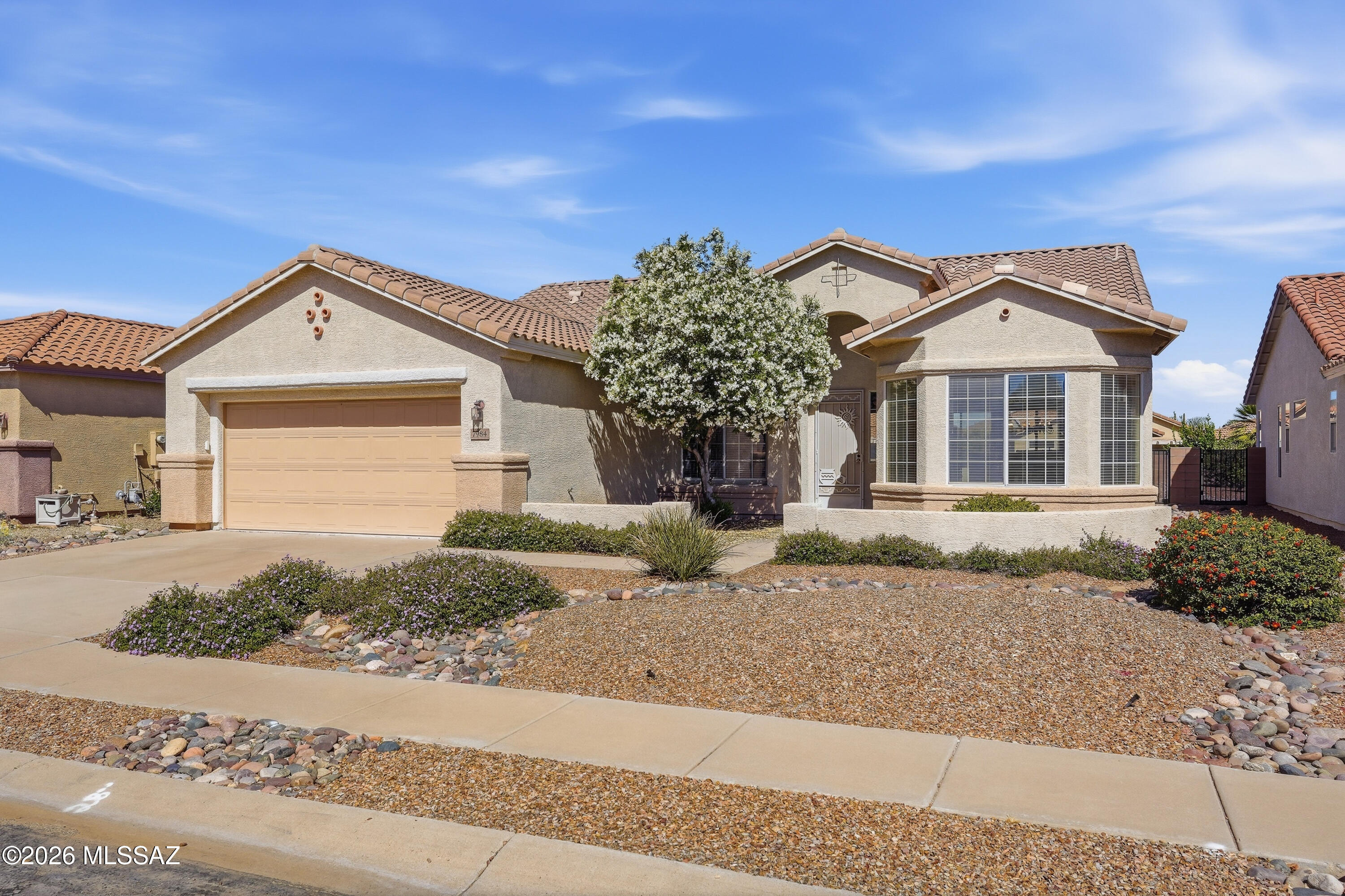 Welcome home to this spacious residence in the highly sought-after 55+ active adult community of Sunflower! This popular Kachina model is the largest floor plan offered by the builder, featuring an impressive 1,972 square feet of well-designed living space, perfectly sized for comfort and ease.

The home offers two generously sized bedrooms plus a large den, ideal for a home office, craft room, or flexible living space. The bright, open kitchen is filled with natural light and offers ample space for a dining table, making it perfect for everyday living and entertaining. Enjoy the expansive backyard with beautiful views, an ideal setting to relax or host guests. This home has been lovingly maintained and recently updated with fresh interior paint and a brand-new roof, giving buyers peace of mind.

While there is an opportunity to add your own personal touches, this home offers exceptional value in a prime location within this highly desirable neighborhood. Sunflower offers an active and vibrant lifestyle with convenient access to shopping, dining, and everyday amenities, plus an easy drive to downtown Tucson and the airport. Residents enjoy resort-style amenities including a pool and spa, fitness center, bocce ball, tennis courts, and over 45 clubs and activities.

This beautiful home with an open floor plan, high ceilings, and a spacious layout, it's ready for you to make it your own.

At this price, this home won't last long, schedule your showing today!