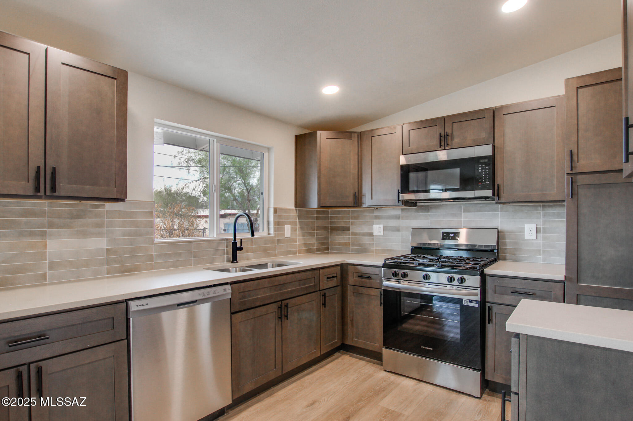 Available now!  Tastefully updated home!  Features include Quartz countertops, luxury plank flooring, warm cabinets, neutral tile backsplash, fresh interior and exterior paint. Bathroom with earth tone tile shower surrounds, vanity and Quartz countertops.  A must see!