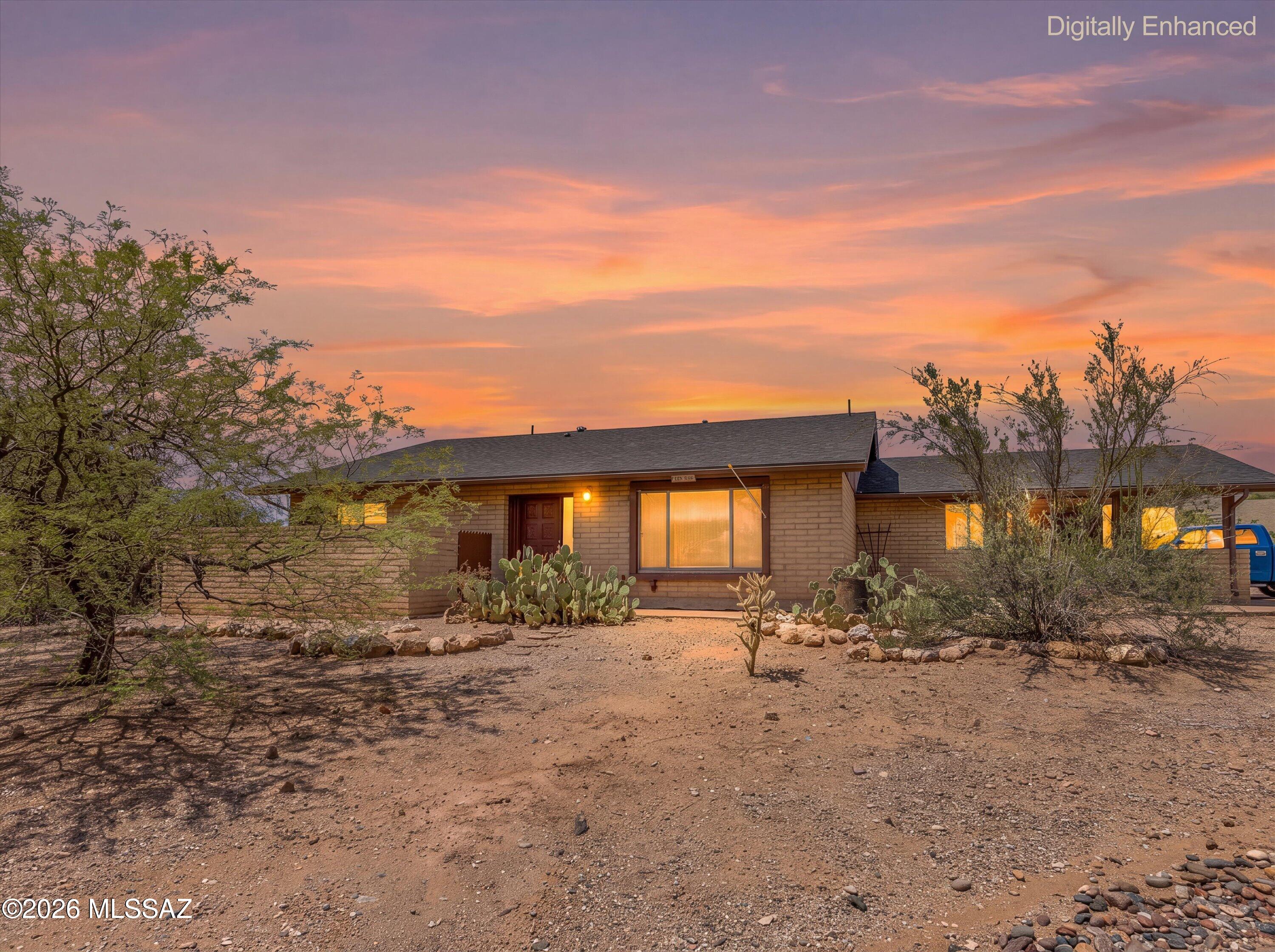 Welcome home to this move-in ready gem in Northeast Tucson's desirable Rinconada Hills community. Situated on a spacious 0.85-acre corner lot, this exceptional property features a north-facing backyard with breathtaking Catalina Mountain views. Offering 2 bedrooms, 2 bathrooms, and 1,857 square feet, the thoughtfully designed floor plan includes a generous living room, separate family room, dining area, and dedicated laundry room. The updated chef's kitchen is perfect for entertaining with granite countertops, rich cherry cabinetry, a center island with breakfast bar, and stainless steel appliances. Enjoy peace of mind with numerous recent updates, including a new roof (2023), HVAC system (2020), pool filter (2026), glass slider and kitchen picture window (2026), new walk-in shower in..... ..... the primary suite, and updated laminate flooring. The spacious primary retreat also features a large walk-in closet. Step outside to your private backyard oasis, complete with a covered patio, sparkling swimming pool, and stunning Catalina Mountain views. The expansive lot offers a long driveway with ample space for RV parking, a boat, or all your recreational toys. This move-in ready home combines comfort, quality updates, and incredible outdoor living in one of Northeast Tucson's most desirable locations.