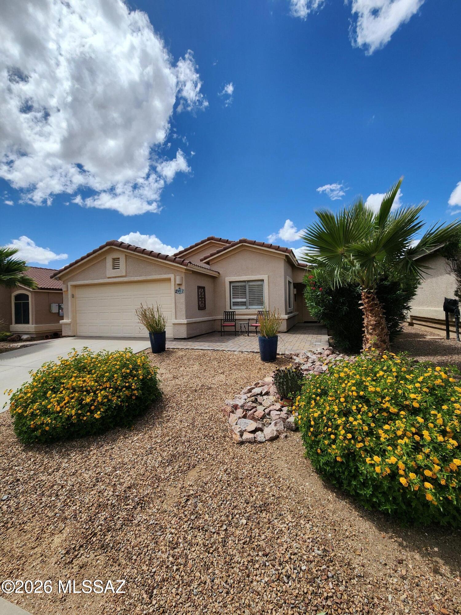 Come check out this immaculately maintained 3 Bedroom/2 Bathroom home in the Rams Canyon enclave. This home offers comfort, style, and a touch of luxury! French doors from the spacious family room open to a covered patio overlooking a beautifully landscaped and fully irrigated yard featuring an in-ground spa with a stone water feature, Pavers and fully grown fruit trees--perfect for relaxing in privacy. Enjoy breathtaking mountain views from the eat-in kitchen, complete with a breakfast bar and plenty of natural light. The home now boasts brand-new luxury flooring throughout and an updated wood burning fireplace that serves as a stunning centerpiece for the living area. the location can't be beat--just minutes from hiking trails, shopping, entertainment, and restaurants.