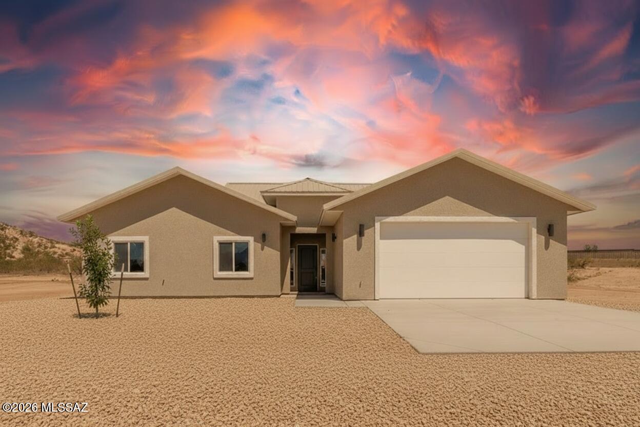 Welcome to your dream home! This brand-new Mc2 Homes masterpiece sits on 3.88 acres of wide-open desert beauty, complete with breathtaking mountain views! Boasting 1,675 sq. ft. of bright, modern living, this 3-bedroom, 2-bath home was designed with comfort, style, and functionality in mind.

Step inside and fall in love with the open-concept floor plan, where the stunning kitchen shines with soft-close drawers, sleek finishes, and tons of workspace—perfect for cooking, entertaining, or gathering with friends.

The luxurious primary suite is your own private retreat, featuring a walk-in shower, a spacious walk-in closet with custom built-ins, and plenty of room to unwind. With an extended 2-car garage, smart storage throughout, and light pouring in from every angle, this home truly has it all. Experience the perfect blend of style, space, and serenity in a brand-new build ready for you to make your own!