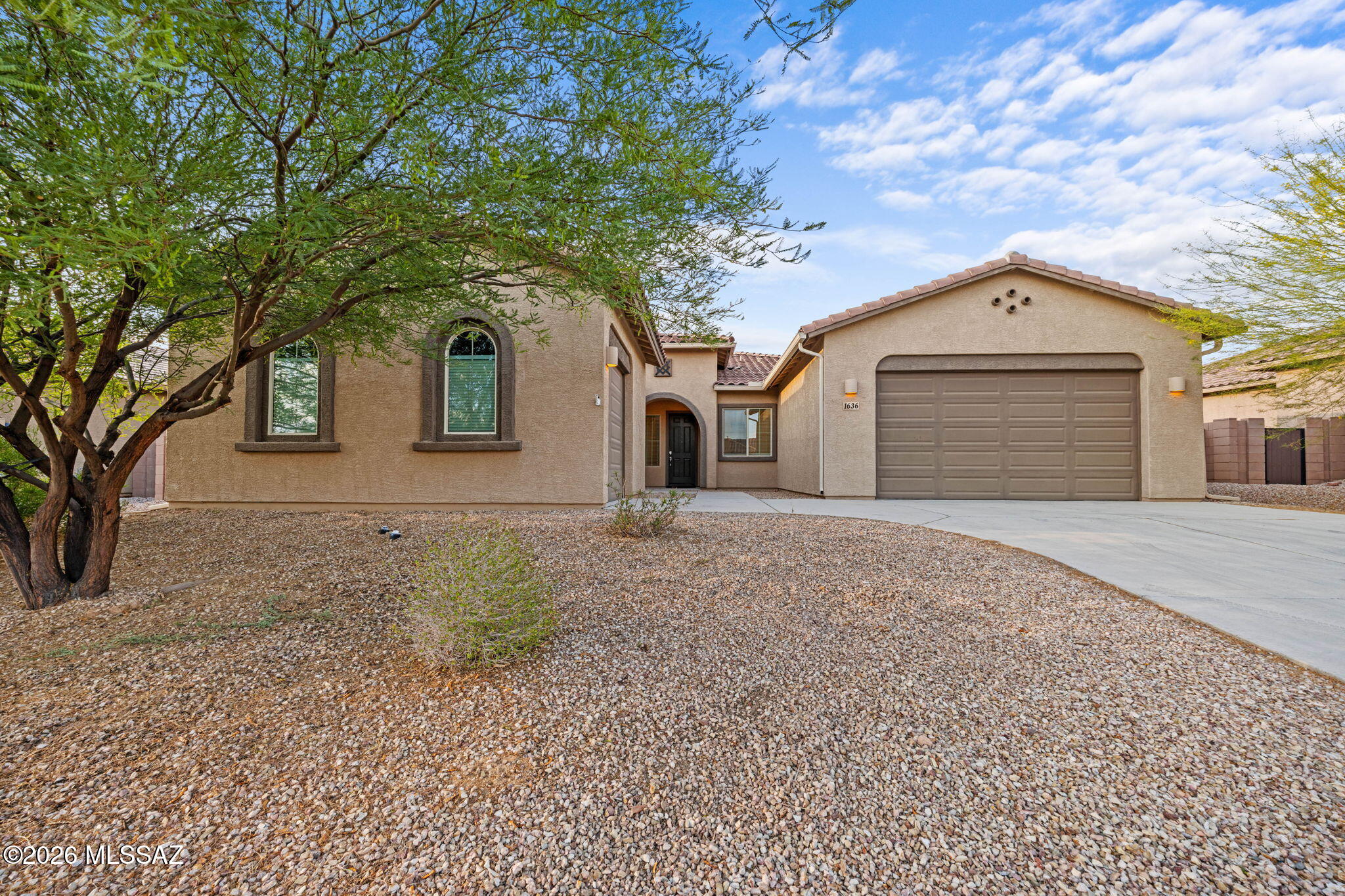 Beautiful ''Next Gen'' home designed for flexibility, comfort, and modern living. Featuring 4 bd 3 full ba 3 garage spaces and tucked away in a conveniently located neighborhood in Oro Valley. This well-maintained property features inviting living spaces, a functional floor plan, and a private attached suite with its own entrance through the separate garage space -- ideal for multi-generational living, guests, a home office, or added privacy.