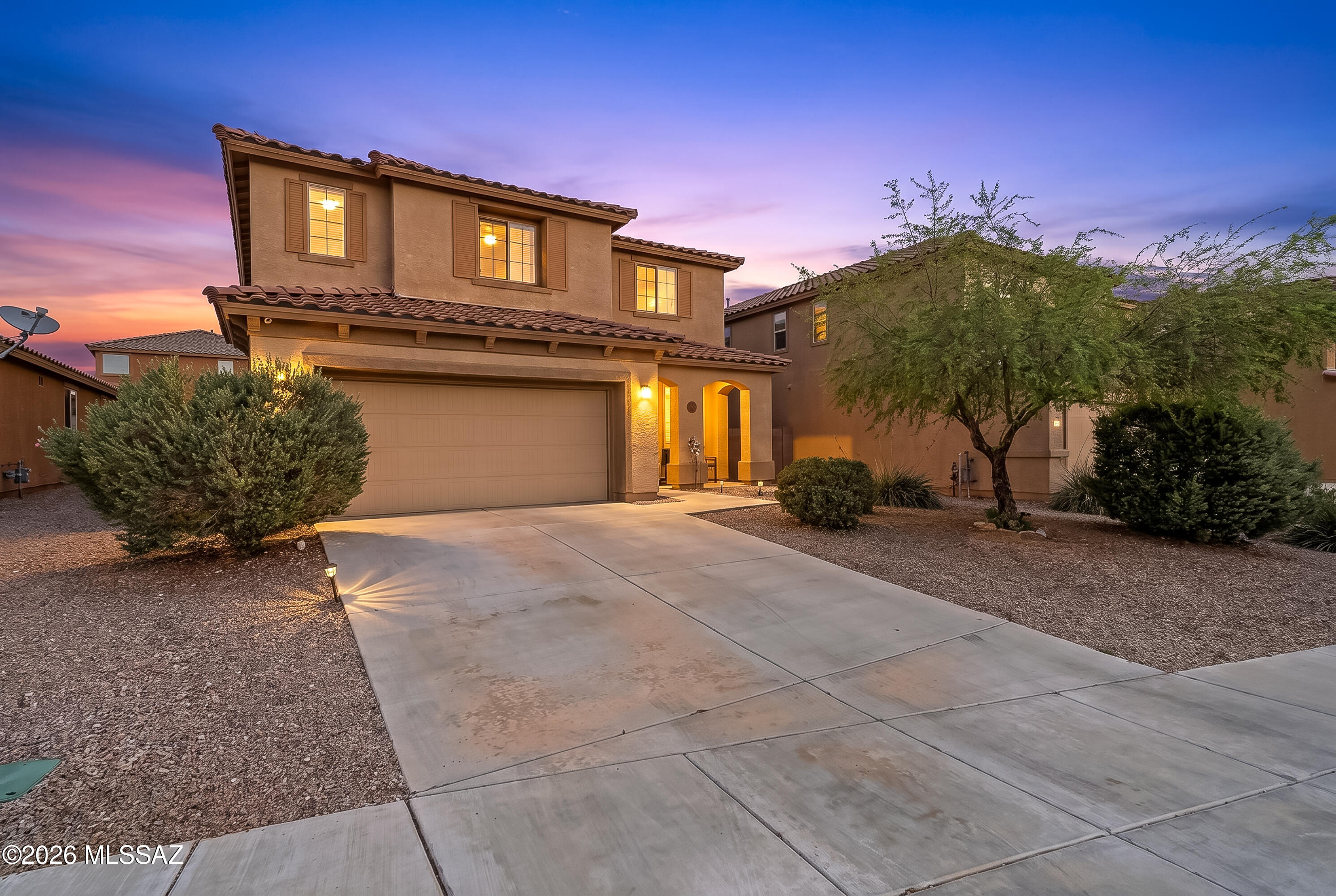 Looking for a wonderful family home in a great Oro Valley neighborhood? This is it. Located in desirable Rancho Vistoso community, this home features 4 bedrooms, loft, 3 baths and tons of extra space to enjoy.  Terrific floorplan offers great flexibility and a multigenerational plan. Room downstairs makes a great office/den with double door entry but could easily be an additional bedroom perfect for in-laws, seniors, or teenagers with full bath downstairs. Primary and three additional bedrooms upstairs with amazing loft area. Primary suite is oversized and includes en-suite bath with shower, large soaking tub, plus walk in closet creating a private retreat.  Large Great Room with dining is open to the kitchen with rich wood cabinets, granite countertops and stainless-steel appliances. Kitchen also has walk in pantry, kitchen island with sit up bar and tons of countertop space perfect for entertaining family and friends. Nice sized backyard includes extended covered patio, travertine pavers, large grassy area, and mountain views. Located within close proximity to neighborhood parks, basketball court, walking trails, bike loop, charter schools, Oro Valley hospital, shopping and restaurants yet tucked away in a peaceful quiet setting.