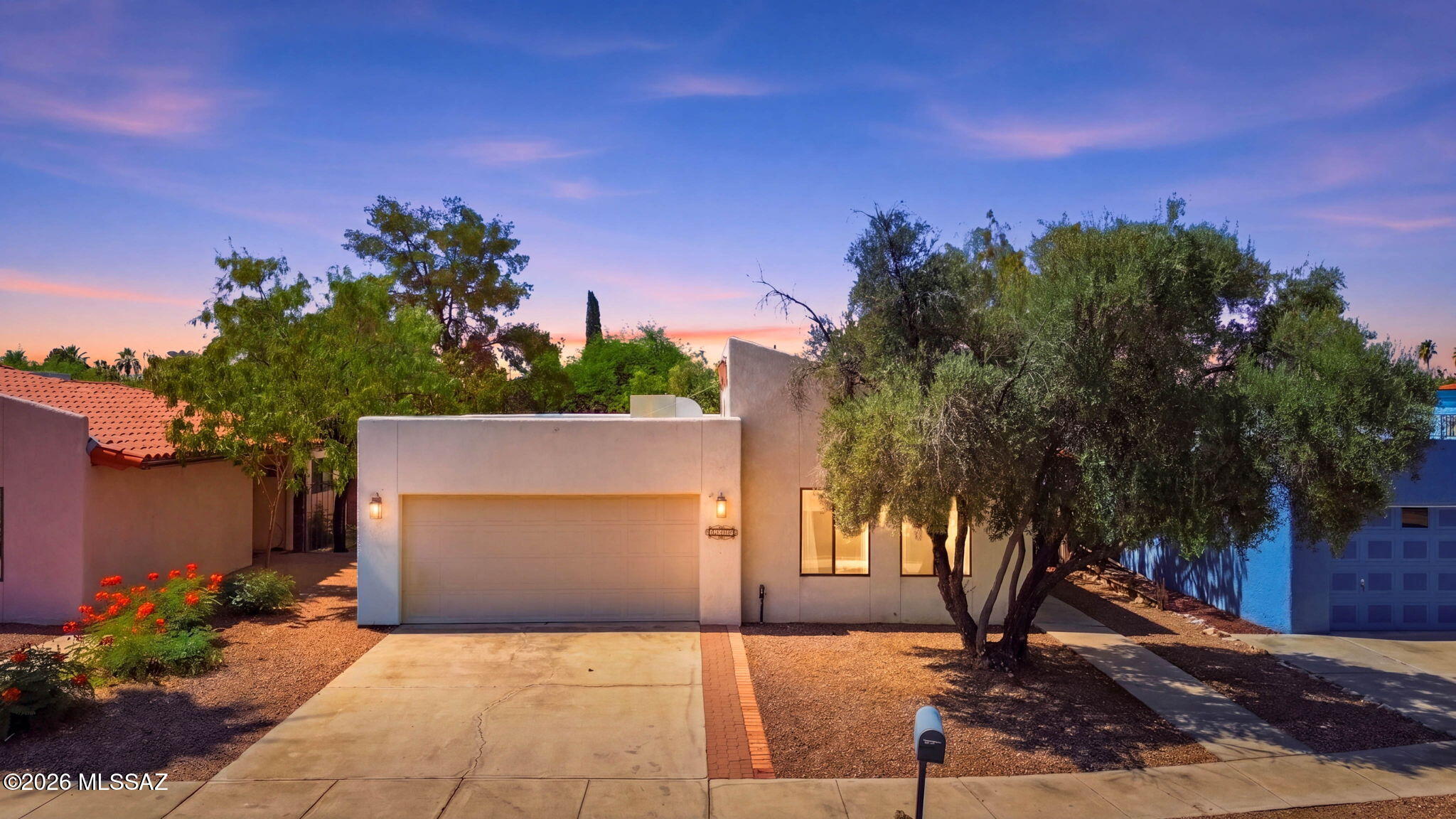 Beautiful East Side Tucson home featuring 2 bedrooms and 2 bathrooms with a spacious and functional layout. No carpet throughout with newer flooring! Large great room with an easy open renovated kitchen bar to dining room table flow. This move-in ready home includes a garage, fresh interior paint, and low-maintenance turf landscaping for easy outdoor living year-round. Conveniently located near schools, shopping, dining, and parks, this home offers both comfort and convenience in a great Tucson location. All appliances convey!
