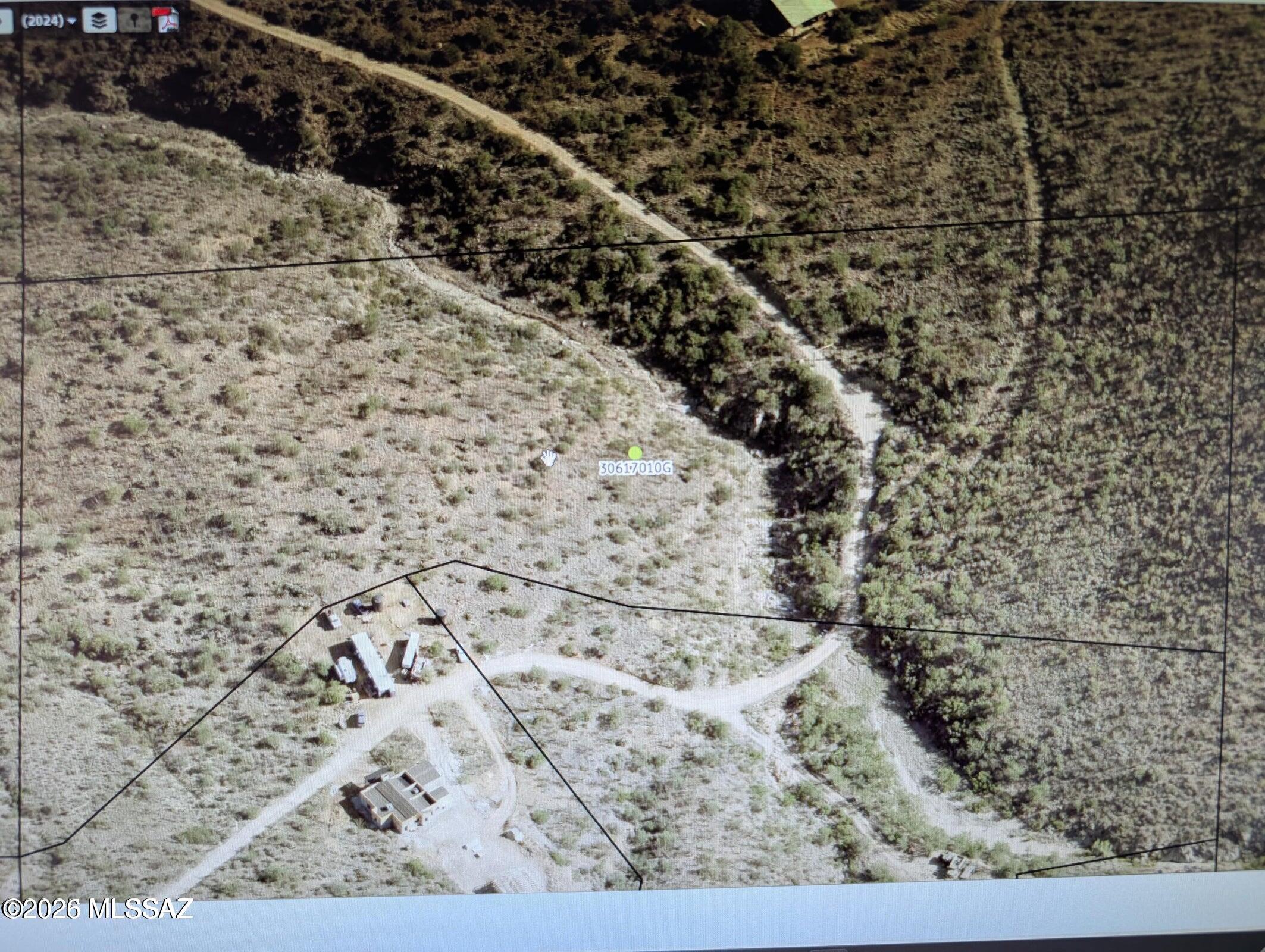 This unique property offers the potential to be divided into two separate parcels, providing flexibility for future development or investment opportunities.

Enjoy breathtaking mountain views and the beauty of the surrounding natural desert landscape. With its secluded setting, the property delivers exceptional privacy and an off-the-grid lifestyle while still remaining conveniently accessible.

Located just 15 minutes from the I-10 Freeway/Sonoita Highway exit, you'll have the perfect balance of peaceful desert living and easy access to nearby amenities.

Be sure to watch the drone footage to fully appreciate the property's stunning views, expansive terrain, and remarkable surroundings.