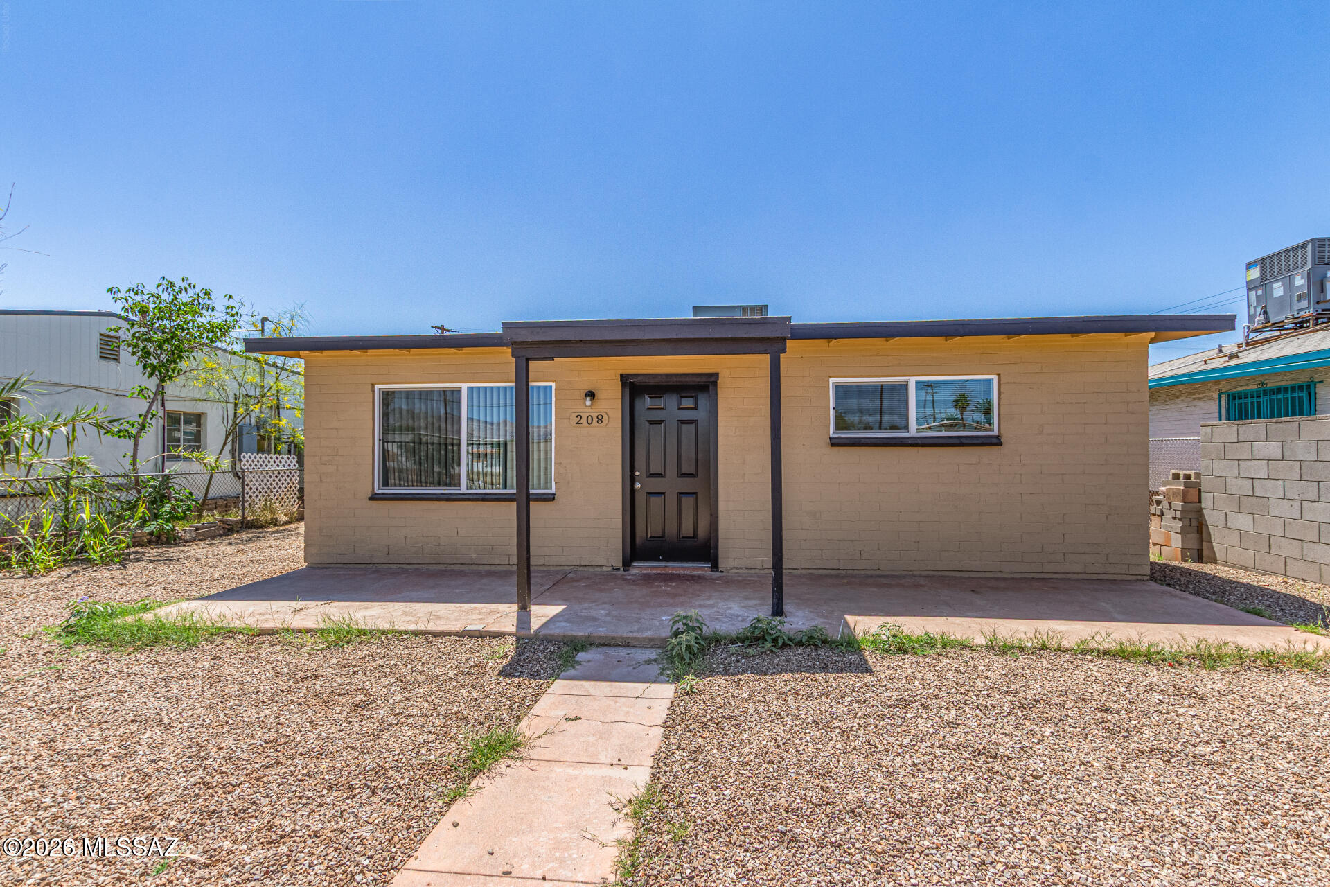 Become the proud owner of this fully walled/fenced home that has been tastefully remodeled! Inviting living & dining room welcomes you upon entering, featuring wood-look tile flooring, abundant natural light, and fresh paint throughout. Renewed kitchen comes with white cabinets, stainless steel appliances, and recessed lighting that brightens every corner. All sizable bedrooms promise restful nights, each with a well-sized closet for added comfort. Oversized backyard provides a covered patio where you can sit and relax after a busy day. Excellent location, close to schools, parks, and dining spots. What are you waiting for? This amazing abode is ready for you to move in and enjoy!