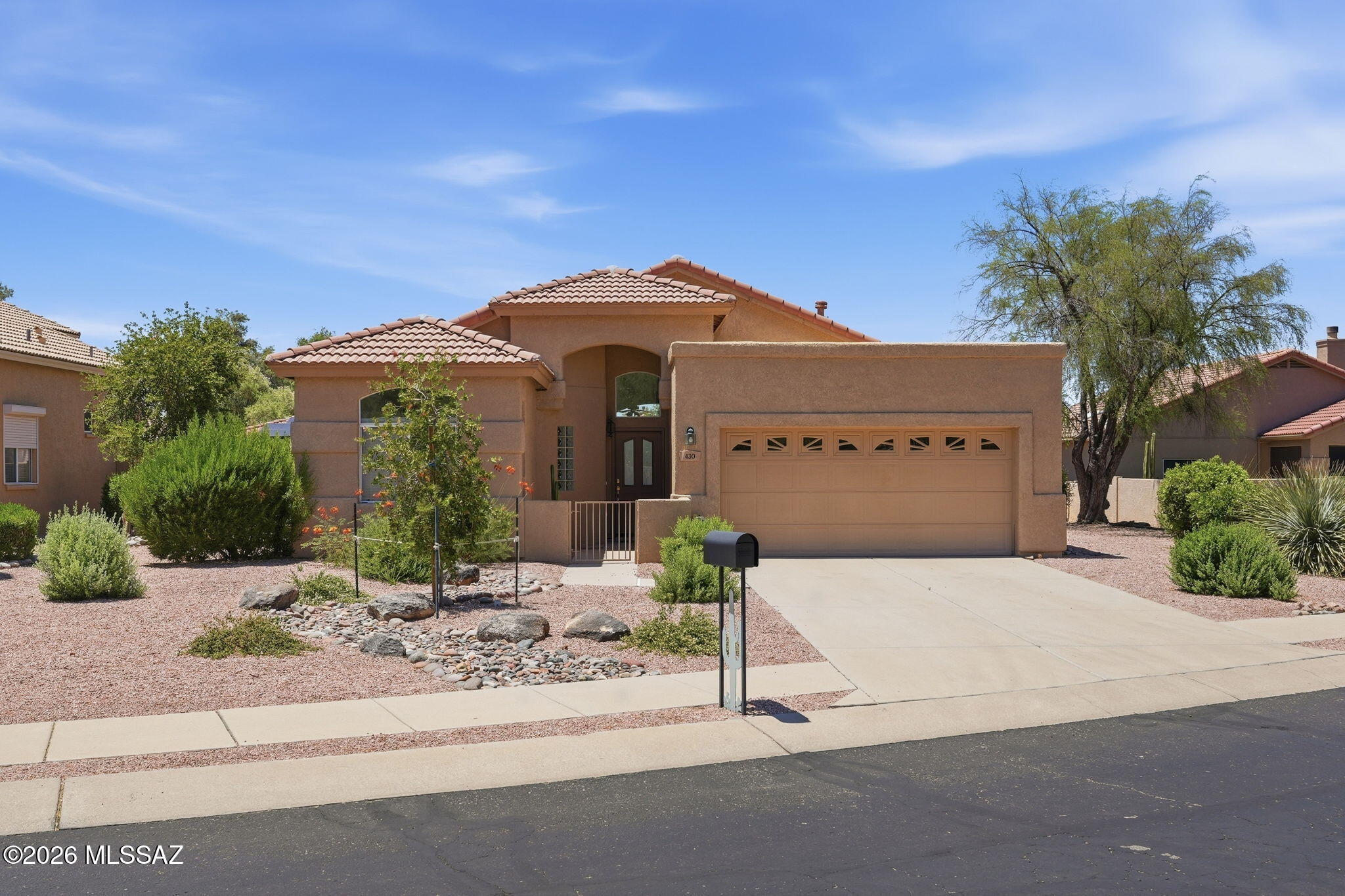 Enjoy easy living & mountain views in this well maintained 3BR, 2BA home in small, quiet, gated community within Oro Valley Country Club. Light, bright, & move-in ready, desirable split-bedroom floor plan features high ceilings, abundant natural light, an inviting layout. Kitchen with updated floors, counters, glass tile backsplash & newer appliances. Stylish & functional space for everyday living.
Step outside to mature, easy-care landscaping, that includes pistachio tree, . Newer HVAC system provides added peace of mind.  Garage with lots of built-in storage. Whether you're looking for a full-time residence or a seasonal retreat, this home offers the perfect blend of comfort & convenience. Canada Del Oro River Park Walking Trail minutes away.