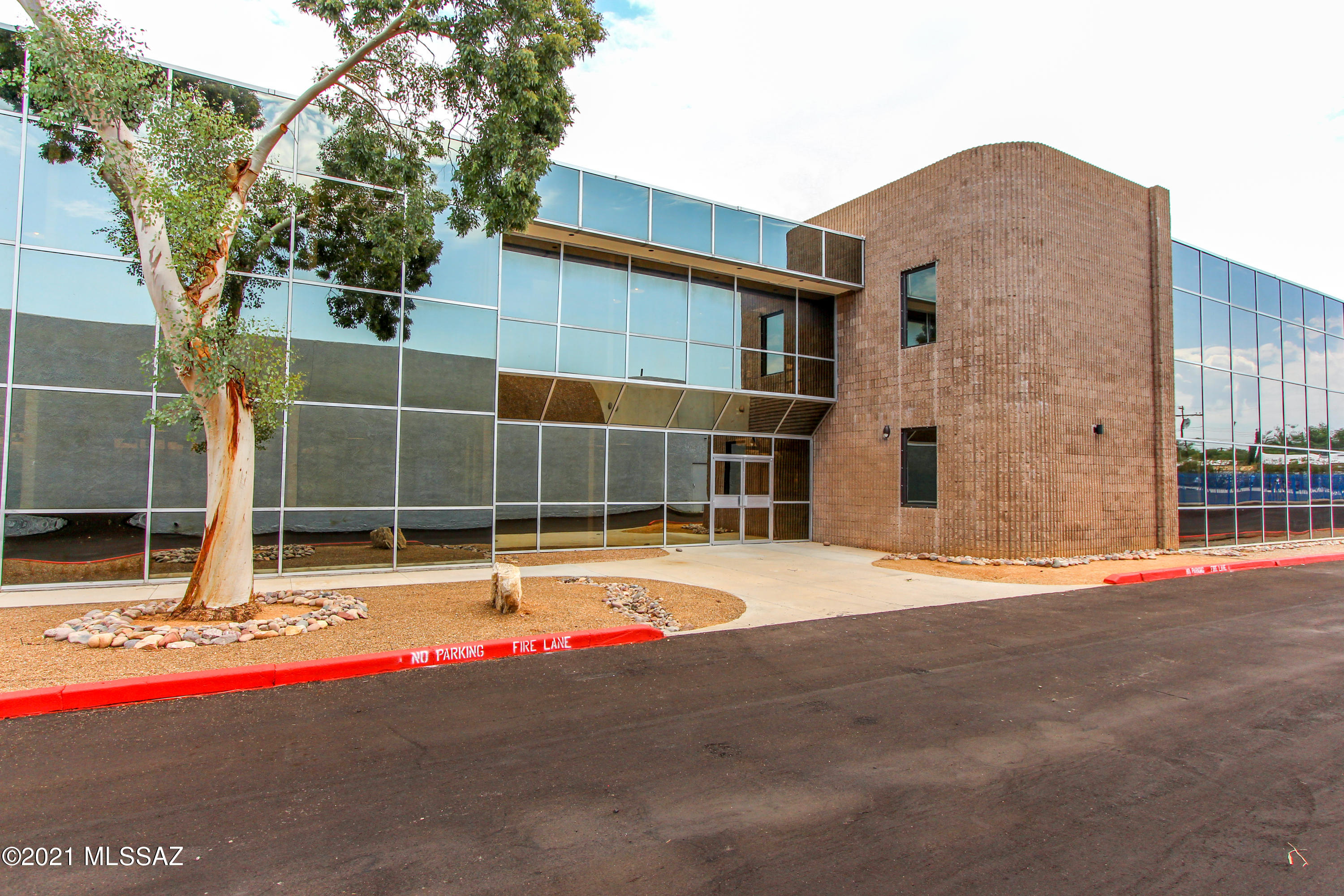 Large office space available in modern building with covered parking.