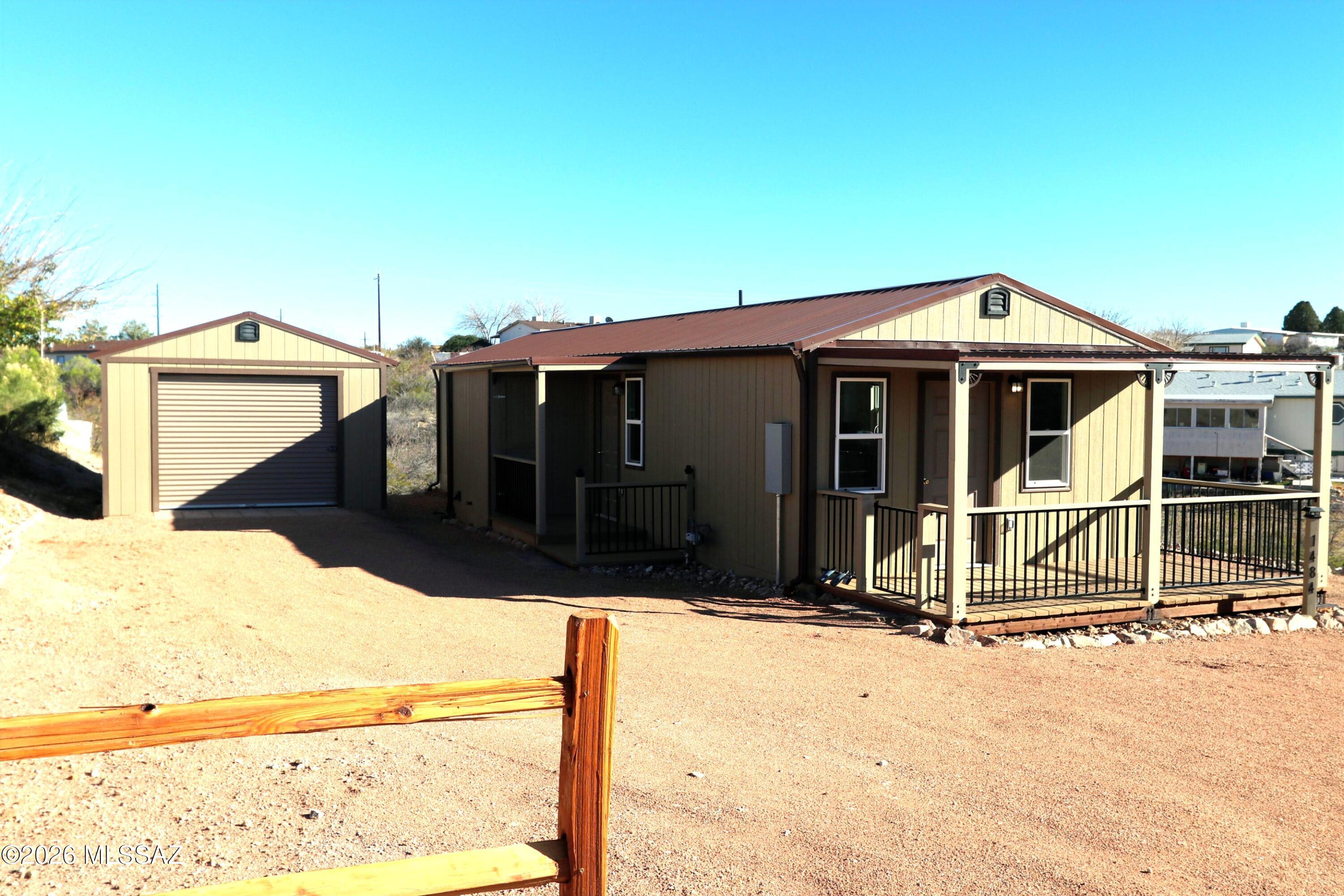 Beautiful new site built 2 bedroom, 2 bath site built house located in the Tombstone Territory Estates in Tombstone, Arizona. Entertain your guests in-style while sitting out on your covered veranda , Home feels clean and fresh with all new stainless steal appliances, lovely hardwood laminate flooring, recessed lighting, dual-paned windows and a 14x26  stand alone garage. Live in suburban Tombstone, AZ and be a 10 minute drive to Old Tombstone where all the action happens.
SELLER MAY OFFER CLOSING COST ASSSTANCE FOR RIGHT OFFER.