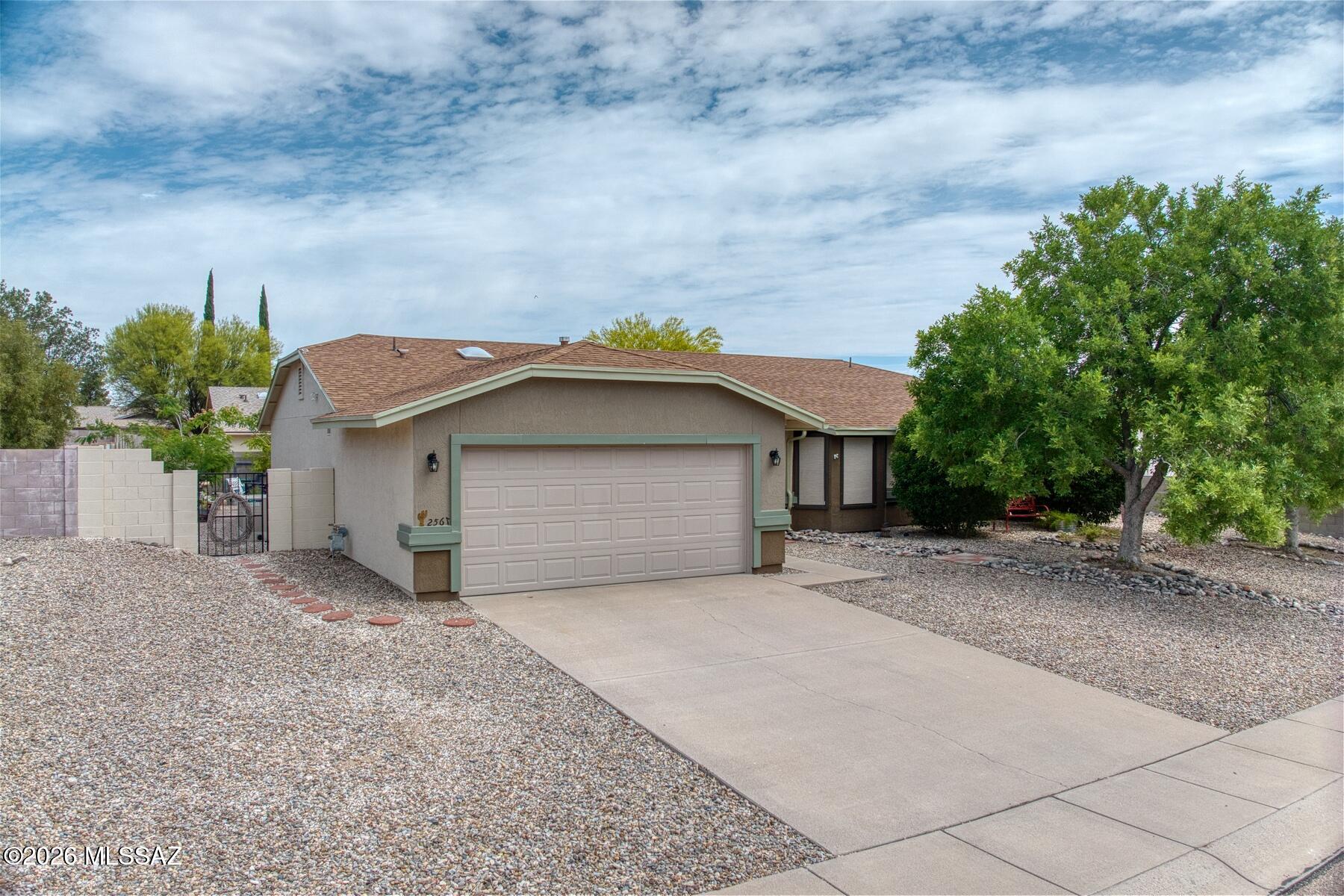 This is an Amazingly well maintained and updated, 3 Bedroom 2 Bath Home, The great use of space provides for an informal Great Room including Kitchen a Keeping Room, and a Very cool Coffee Corner, in addition to a Formal Dinning area and a formal Living Room. There are Ceiling fans in every room, and both Zoned AC and Evaperative Cooling for your choice depending on the weather and activities. Or enjoy the out door spaces instead, this home shows multiple outdoor gather spaces, or room for gardening if you prefer. This home is an absolute MUST SEE - Professionally Decorated to the owners taste and painted in various tones to accent the homes architectural features.