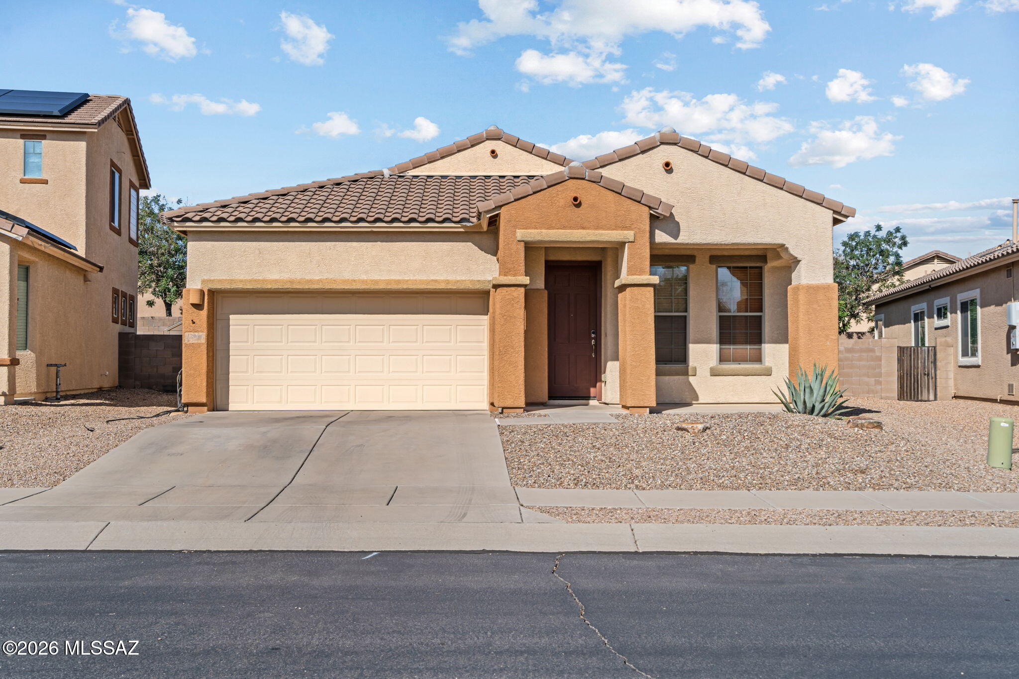 Welcome home to this beautifully maintained 1,966 sq ft gem nestled in the highly sought-after community of Marana! This 3-bedroom, 2-bath home offers the perfect blend of comfort and functionality -- ideal for families and entertainers alike. Step inside to discover a formal living room that sets a warm, welcoming tone, flowing into a spacious family room perfect for everyday living. The light and bright kitchen is sure to delight, offering a cheerful space to cook, gather, and connect. Retreat to the generous primary suite -- your own private sanctuary after a long day. Outside, the easy-maintenance backyard means you can spend less time on upkeep and more time enjoying the beautiful Arizona lifestyle. Homes like this in Marana don't last long -- come see it for yourself!
