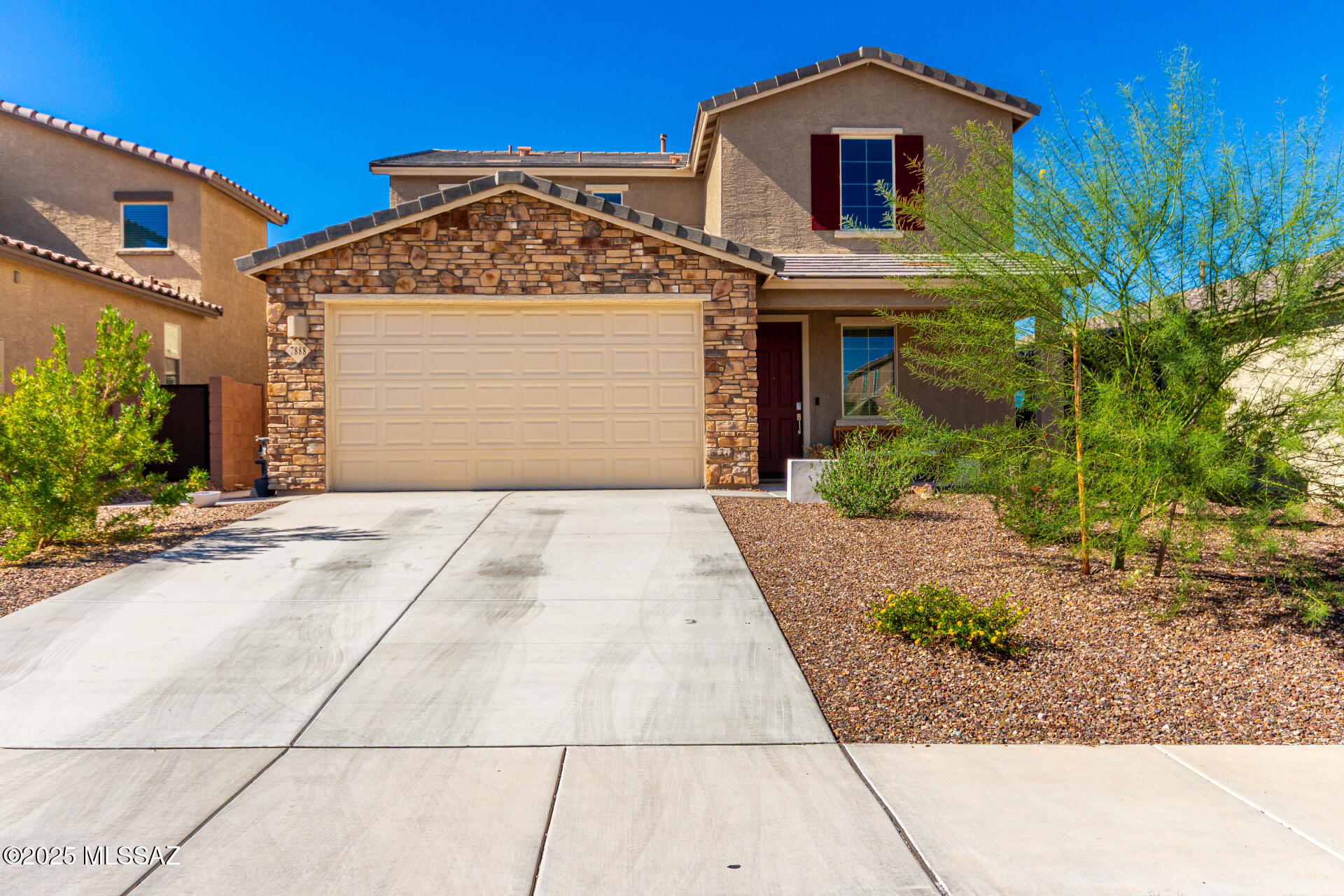 Come and see this Beautiful! Multi-Generational Home with separate own space with Kitchen, Living space, Bedroom and Full Bath! 2 Car gargage. Low maintenance landscaping with a cozy Front porch. A neutral palette throughout, Recessed lighting, Soft carpet & Wood looking tile throughout. Excellent floorplan featuring a Formal living room and a welcoming family room that opens to the Impressive Kitchen!Stainless steel appliances, Granit counters, Walk in pantry, Ample white Cabinetry, and a prep Island w/ Breakfast bar make up the Culinary space. Along w/ dual sinks and a walkin pantry. The property had so many amenities in gated community with Amazing Mountain views!!