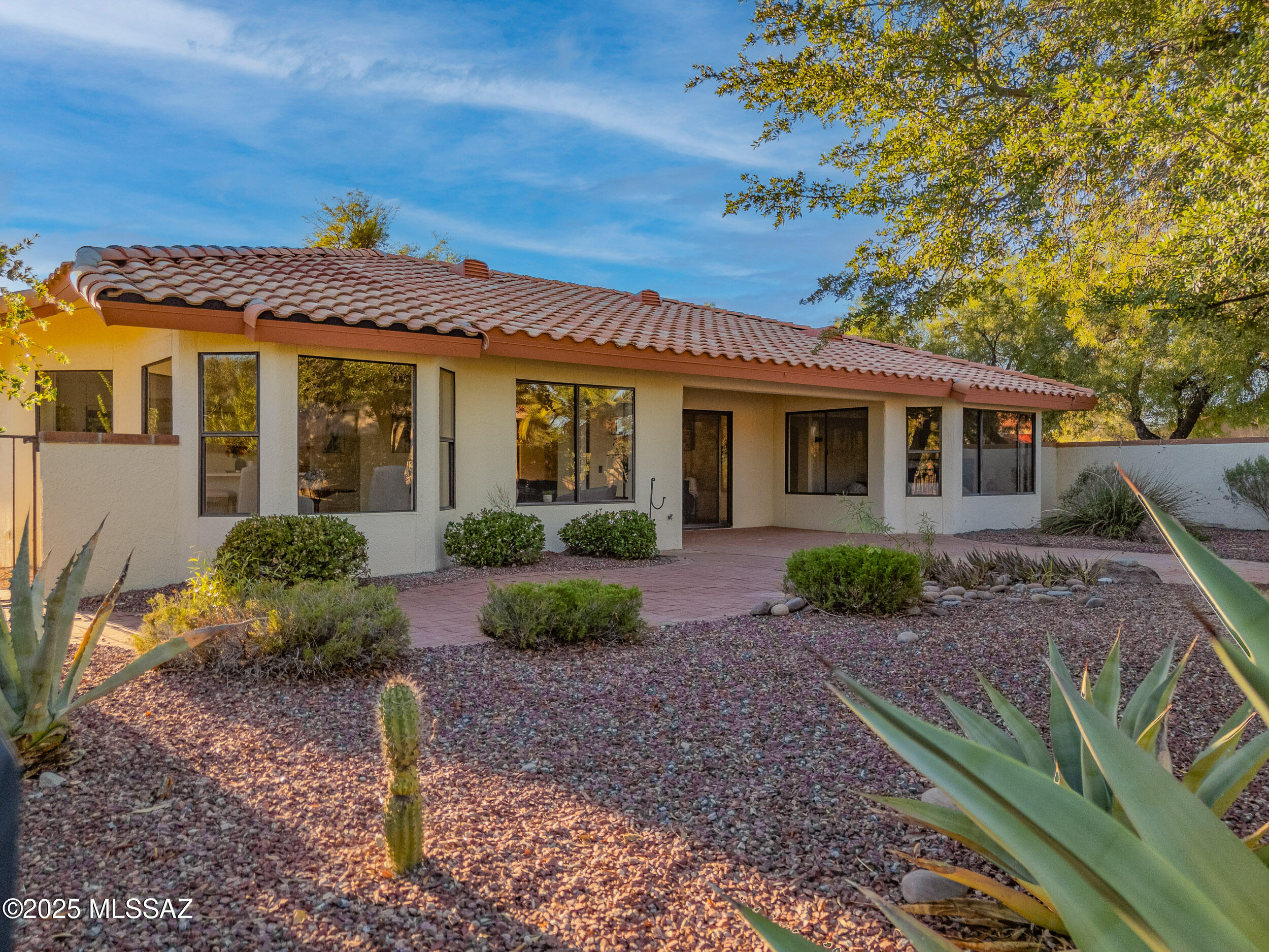 Seller to accept or counter offer between $459,900 and $469,900. Welcome to 14660 N Flagstone Drive in the highly desirable Sun City, Oro Valley. This beautifully updated 2-bedroom, 2-bath home offers approximately 1,560 sqft. of thoughtfully designed living space. This home blends modern upgrades with the comfort and charm you deserve.
The light-filled kitchen is a true showpiece, featuring elegant white cabinetry, sleek quartz countertops, stainless steel appliances, and stylish black hardware. Enjoy morning coffee in the bright breakfast nook with serene views of the lush desert landscape. The open layout creates effortless flow from the kitchen to the spacious dining and living areas  perfect for entertaining or relaxing.
Retreat to the primary suite with a newly remodeled bath showcasing a stunning walk-in shower with designer tile and matte black fixtures. A guest bedroom and second updated bath offer space for visitors or a home office.
Outside, mature landscaping and peaceful views create a tranquil setting to enjoy Arizona's sunshine and natural beauty. Sun City Oro Valley offers world-class amenities including golf, fitness centers, pools, pickleball, walking trails, and countless clubs and social activities  the perfect balance of active living and relaxation. Move-in ready and elegantly refreshed, this home invites you to start your next chapter in one of Oro Valley's premier communities.