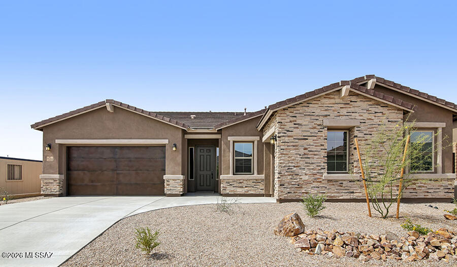 The ranch-style Julia plan greets guests with a charming covered front porch. Once inside, an extended entry leads to an expansive gourmet kitchen with a center island, large walk-in pantry, breakfast nook and great room for entertaining. You'll also appreciate the flex room and a formal dining room with adjacent covered courtyard off to the side of the home. This plan offers three additional bedrooms and a bath. Personalization features include multi-slide doors in the great room and more!