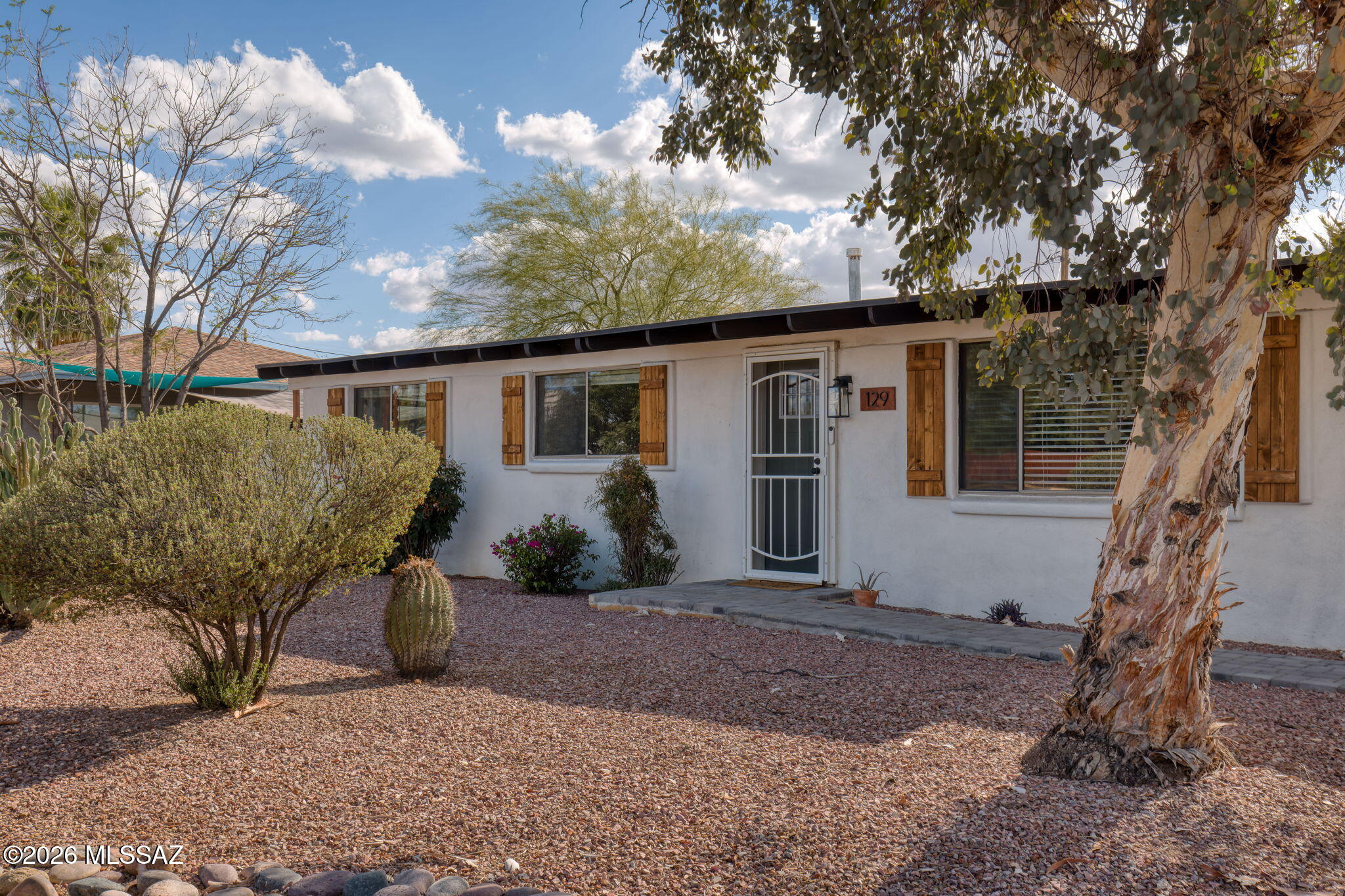 Classic burnt adobe with stucco finish home that doesn't just blend character and modern design- it owns it. Perfectly positioned in the heart of Tucson with no HOA, this is where style meets strategy. 4-bedroom floor plan featuring a primary bedroom with en-suite bathroom, plus junior suite with full bathroom and 2 more bedrooms plus a full guest bathroom- this home delivers the kind of layout buyers, and investors, are searching for. Inside, the open-concept design brings the living, dining, and kitchen spaces together in a way that feels intentional and functional.The kitchen shows off crisp white cabinetry and a statement island with bar seating. A family room with wood burning fireplace add flexibility, giving you options for guests, work-from-home space, or maximizing rental potentia Every bathroom has been thoughtfully updated with a clean, cohesive look that feels fresh, modern, and move-in ready.
Out back, the opportunity continues. A generously sized lot opens the door to creating something special- pool, lounge spaces, outdoor dining, or the ultimate desert retreat under Tucson's iconic skies. And here's where it gets even more compelling- this home isn't just beautiful; it's proven. With a successful track record as a short term rental, it offers real potential for those looking to step into the rental market or expand their portfolio with confidence. Location matters- and this one delivers. Centrally located with easy access to Tucson's top dining, shopping, and attractions, it's exactly where both homeowners and guests want to be. This is more than a home. It's a smart move, a flexible investment, and a space designed to work for you- now and into the future.