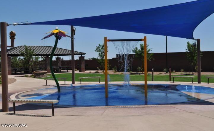 This home sits in Ironwood Crossing (Queen Creek) with an aquatic center perfect for those hot summer days and several private parks. This beautifully upgraded home is designed with both comfort and functionality in mind, this spacious floor plan features 3 bedrooms, 2 bathrooms, a private den perfect for a home office or playroom, and an oversized 3-car tandem garage. The open-concept great room and split master layout create the perfect balance of privacy and entertaining space. At the heart of the home is a chef-inspired kitchen featuring stainless steel appliances, granite countertop, a built-in oven and microwave, cooktop, abundant cabinetry, and a large center island. The refrigerator, washer, and dryer are all included. Large covered patio leads and spacious backyard. See Aquatic Step outside and enjoy all that Ironwood Crossing has to offer, including:
Resort-Style Aquatic Center
Numerous Parks & Playgrounds
Walking Trails & Greenbelts
Sports Courts & Community Amenities
Convenient Access to Shopping, Dining & Schools

Whether you're hosting family and friends or simply relaxing at home, this property offers the perfect combination of style, space, and community living.

Don't miss your opportunity to own this exceptional home.