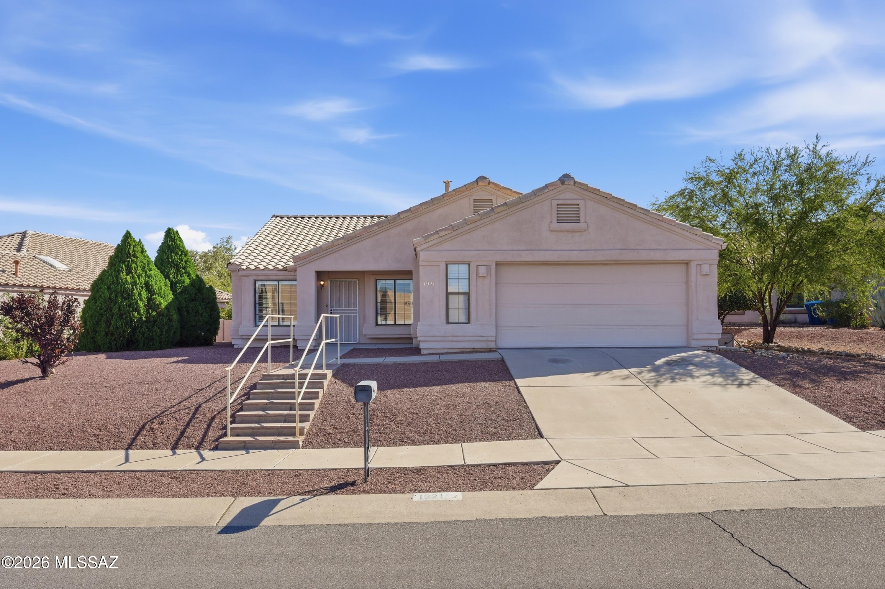 Finding a true 4-bedroom home in Green Valley is rare, making this property a standout opportunity. Whether you enjoy hosting family and friends, need space for hobbies, a home office, an exercise room, or simply appreciate extra room to spread out, this flexible floor plan offers endless possibilities. The home features spacious living and dining areas, a comfortable family room off the kitchen, a breakfast nook, and a kitchen island with bar seating. The primary suite includes a walk-in closet and ensuite bath with a garden tub and separate shower. Situated on an elevated lot, the private backyard offers a covered patio and raised flower beds--perfect for morning coffee, outdoor dining, or weekend barbecues.