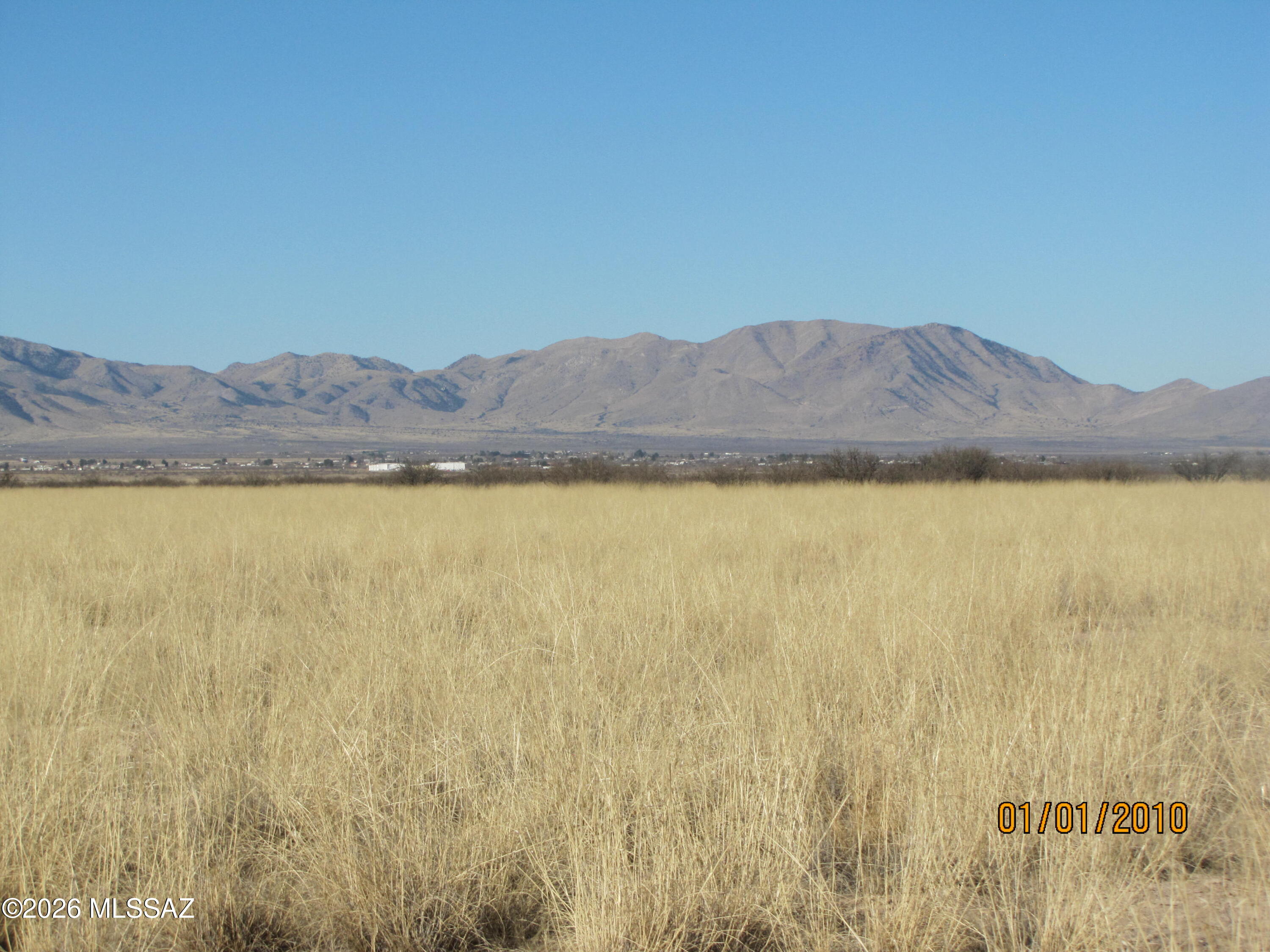 Panoramic views of the Dragoon Mountains and Sulphur Springs Valley from these 4 contiguous residential lots. Parcels are located in an undeveloped area with no roads cut; buyer(s) to determine exact location of parcels and develop access to them. County zoning is for site-built homes. Taxes shown are for all 4 parcels. Sale includes parcels 207-13-165, -166, -167 and -168.