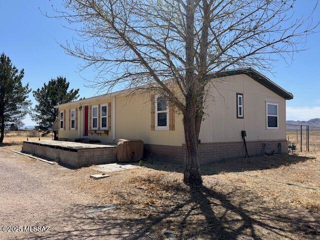Recently updated, this manufactured three bedroom two bathroom home and shop rests on 4+ acres north of Willcox Arizona. There are mountain views in all directions. This is the Headquarters and housing for the Dearing Road Farm. The farm may be purchased separately. Co-listed with Scott Thacker Broker - Stronghold Ranch Real Estate.