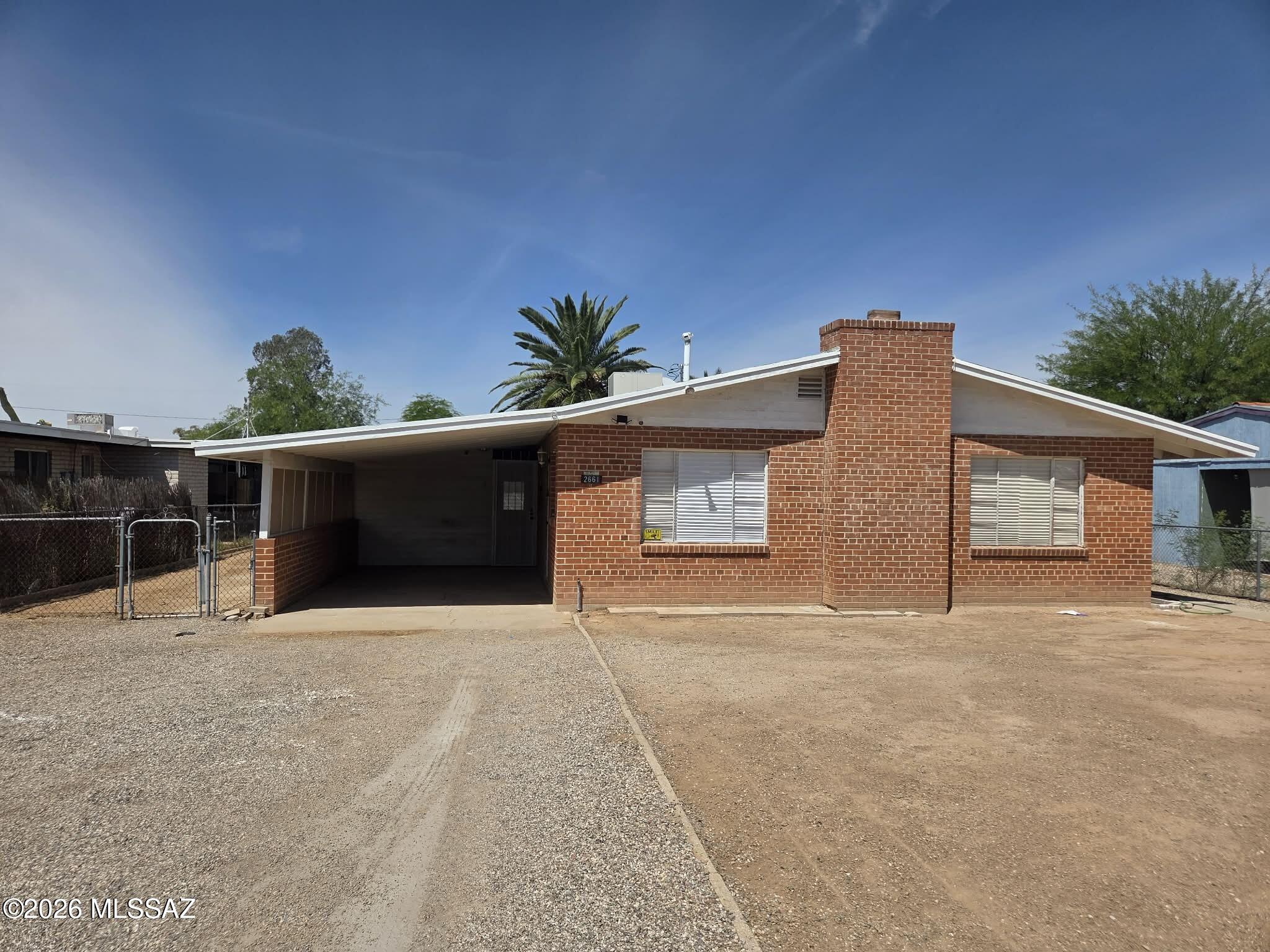 Investors! As-Is Updated red brick house, new carpet and vinyl, fresh paint. Great for an investor, the lot is R2 and can have another unit built for rental income. Priced to sell. As-Is