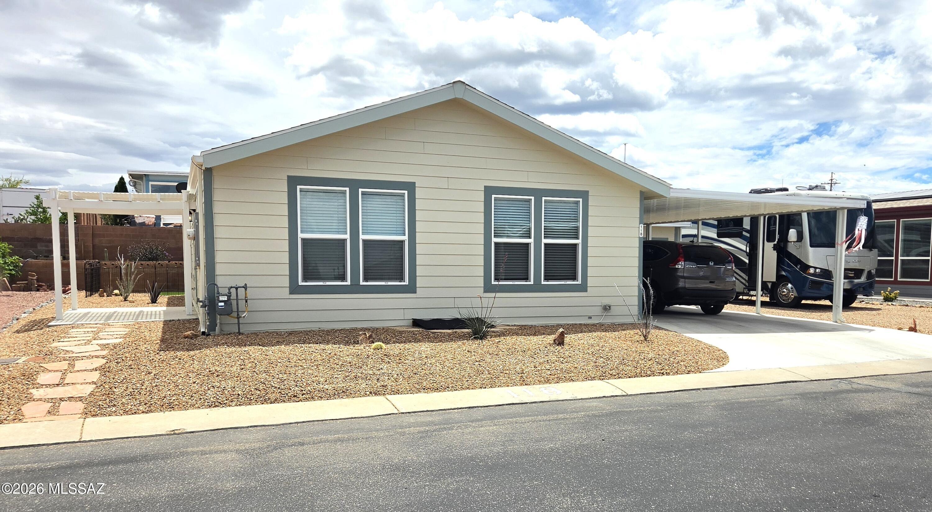 This 2023 Cavco Durango home features a 2 bedroom, 2 bathroom floor plan with a dual vanity and walkin shower in the master bathroom. 
The carport is covering a 16' wide driveway as well as a 12 x 14 finished shed. The shed includes a deep sink and a mini split for climate control. 
For the enjoyment of your flour legged friends there's an artificial turf area in the back yard. 
This is a find you can use year round or as your winter retreat from the elements of winter in the great North.