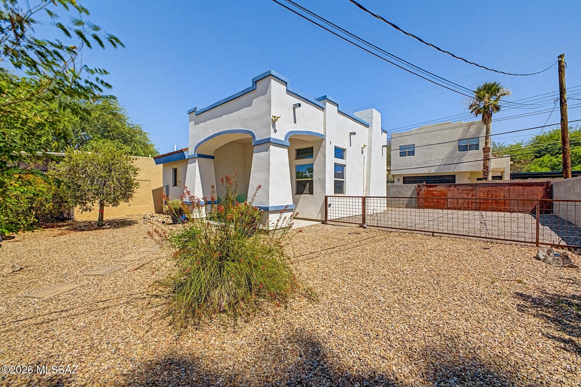 Tucked into Tucson's historic Feldman's neighborhood just moments from the University of Arizona, this distinctive property pairs character, flexibility, and opportunity in one compelling address. The main residence offers 3 bedrooms and 2 baths, while the detached 1-bedroom, 1-bath casita creates the perfect setup for guests, multigenerational living, a private studio, or income potential. Thoughtfully constructed with SABS Expanded Polystyrene, the casita adds an energy-efficient, environmentally conscious element to the property's appeal. Rich in charm and ideally positioned near campus, downtown Tucson, dining, and entertainment, this is a rare central Tucson offering with both lifestyle and investment upside. Whether you're an owner-occupant, investor, or someone seeking a unique property with income potential, this is a rare find in the heart of Tucson.