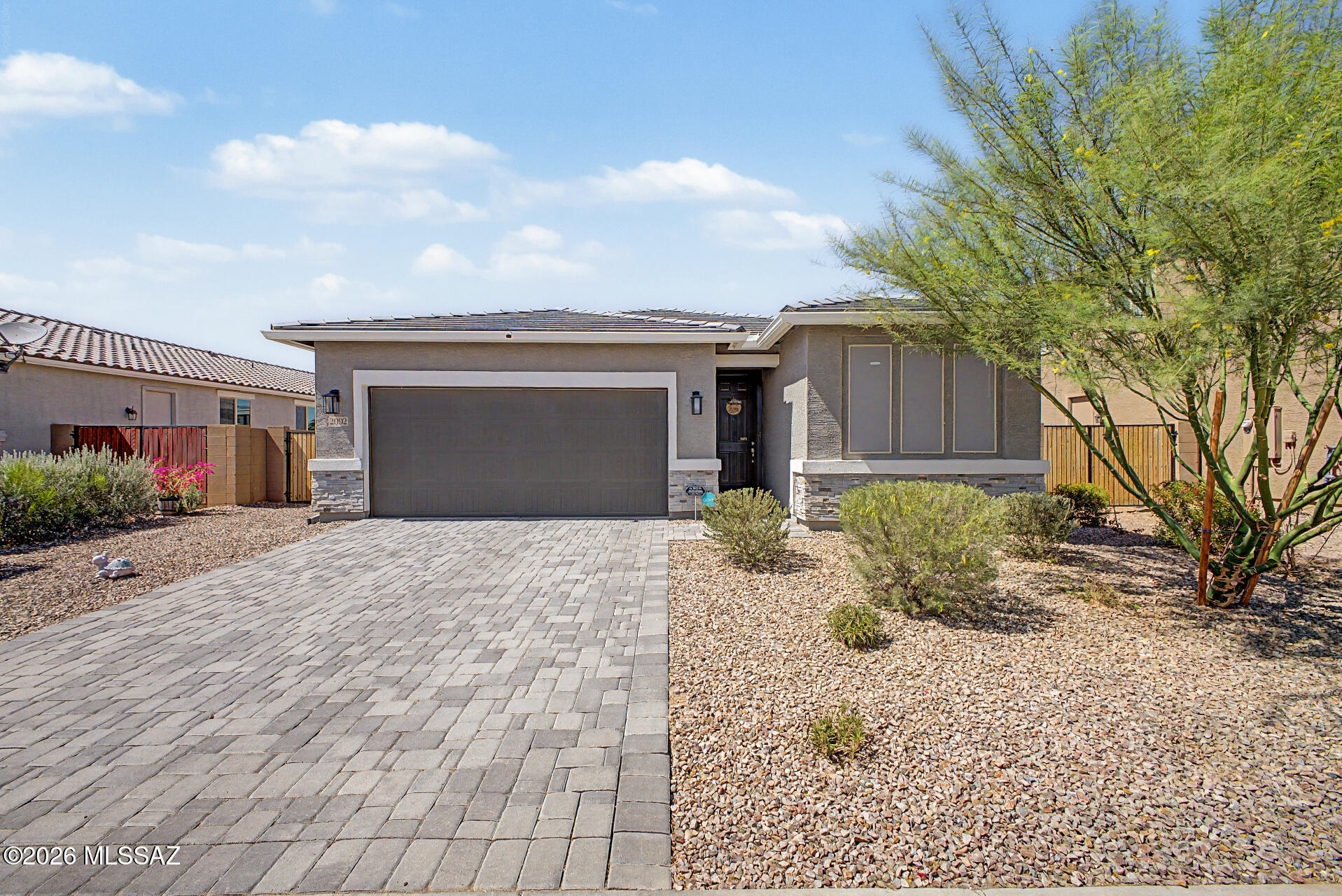 Discover this charming single-story home in Casa Grande! Nestled in a quiet cul-de-sac, offering 3 bedrooms plus bonus room, 2 bathrooms, and a 2-car garage plus double gates! Inside, you'll find bright and inviting living spaces ready to bring you joy, showcasing tile floors, contemporary lighting, plenty of natural light, and a soothing palette that makes every area feel warm and welcoming. Whip up your signature dishes in the spotless kitchen, equipped with pristine white cabinetry, granite countertops, SS appliances, and an island, perfect for midnight snacks. The spacious den is perfect for a home office or hobby area. Get a good night's sleep in the main retreat, including a bathroom with double sinks and a walk-in closet for an easily organized wardrobe. Enjoy year-round entertainment in the backyard, complete with a covered patio perfect for morning coffee, artificial grass, and a refreshing pool ideal for sunny days! Hurry up, this gem won't last!