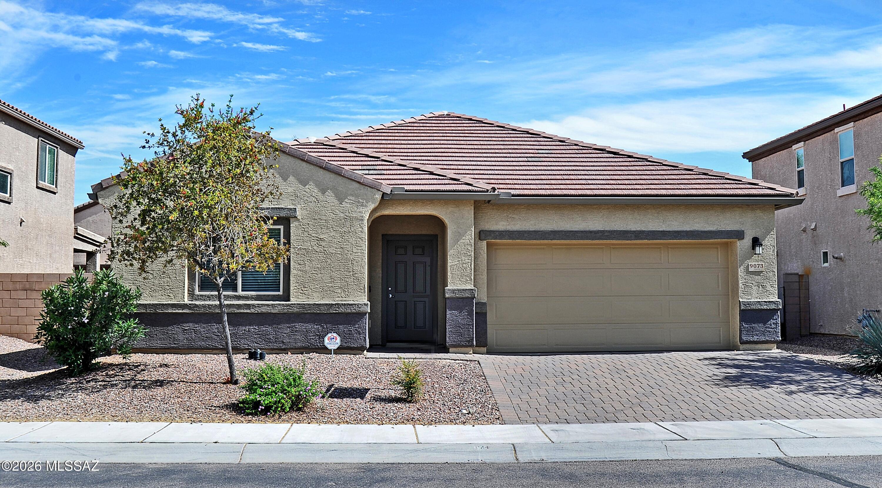 Seller offering a 3.99% interest rate. see in remarks below. Welcome home to 9073 W Birchover Drive, a stunning single-story D.R. Horton residence nestled in the scenic Saguaro Bloom community of Marana. This 4 Bedroom, 3 Bath 2,230 sq. ft. meticulously maintained home offers new two-tone interior paint including the garage plus new exterior paint. The heart of the home is a spacious great room with vaulted ceilings that flows into a luxury kitchen. Chefs will love the granite countertops, central island, pantry, and full suite of stainless-steel appliances.  The floor plan includes an additional room perfect for a den, playroom, or home office.  Modern conveniences abound, including ceiling fans in all rooms, an energy-efficient tankless water heater, and a dedicated laundry room equipped An energy-efficient tankless water heater, and a dedicated laundry room equipped with a newer washer and dryerStep outside to the low-maintenance desert landscaping in both the front and backyards, allowing you more time to enjoy the neighborhood's resort-style perks. Living in Saguaro Bloom means access to world-class community amenities, including a sparkling community pool and splash pad, clubhouse and fitness areas, numerous parks, play areas, and scenic walking trails. This home is conveniently located to shopping, dining, and easy access to I-10.
Seller offering a credit toward a 2-1 temporary interest rate buydown for qualified buyers. Buyers may obtain rates as low as 3.99% in Year 1, 4.99% in Year 2, and 5.99% thereafter. At the current list price, this could reduce monthly payments by approximately $500/month during the first year and $257/month during the second year. Subject to lender approval and borrower qualification. Contact listing agent or lender for complete details.