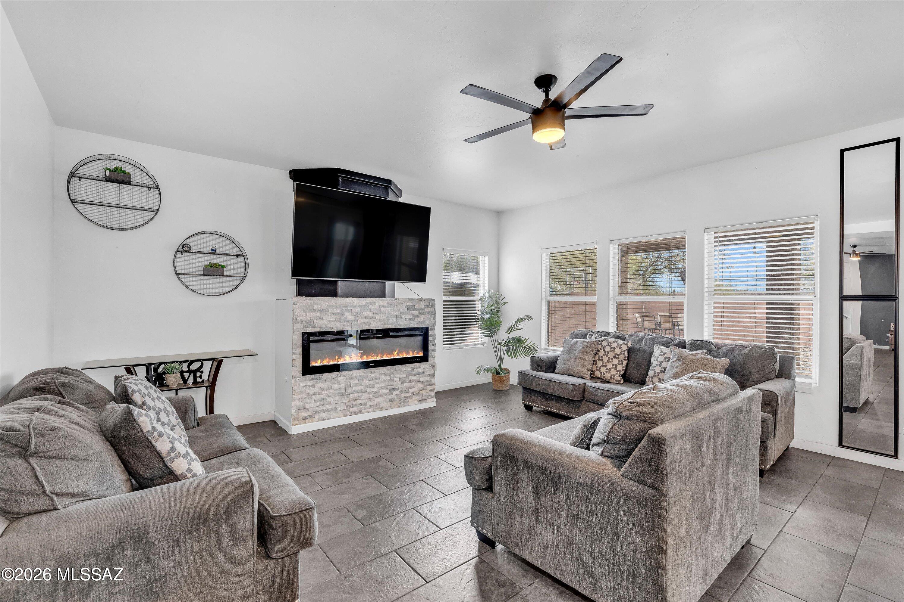 When this homeowner bought the house, they were a family of 4. They quickly grew to a family of 6 and enjoyed the house just the same, making improvements over time and building it into a place all of their kids have lovingly called home. The backyard acquired a built-in bar and ramada. The downstairs bedroom helped as a home office, and the upstairs loft became a 5th bedroom. Over the years their kids have grown through the local school system, the parents have moved up in their careers, and now they have expanded their family to include their first grandchild. They found a new home that fits their growing needs and so it's time for them to offer this one to the next homeowner who will love it as much as they have. Buyer to verify all facts + figures, including those in MLS.
