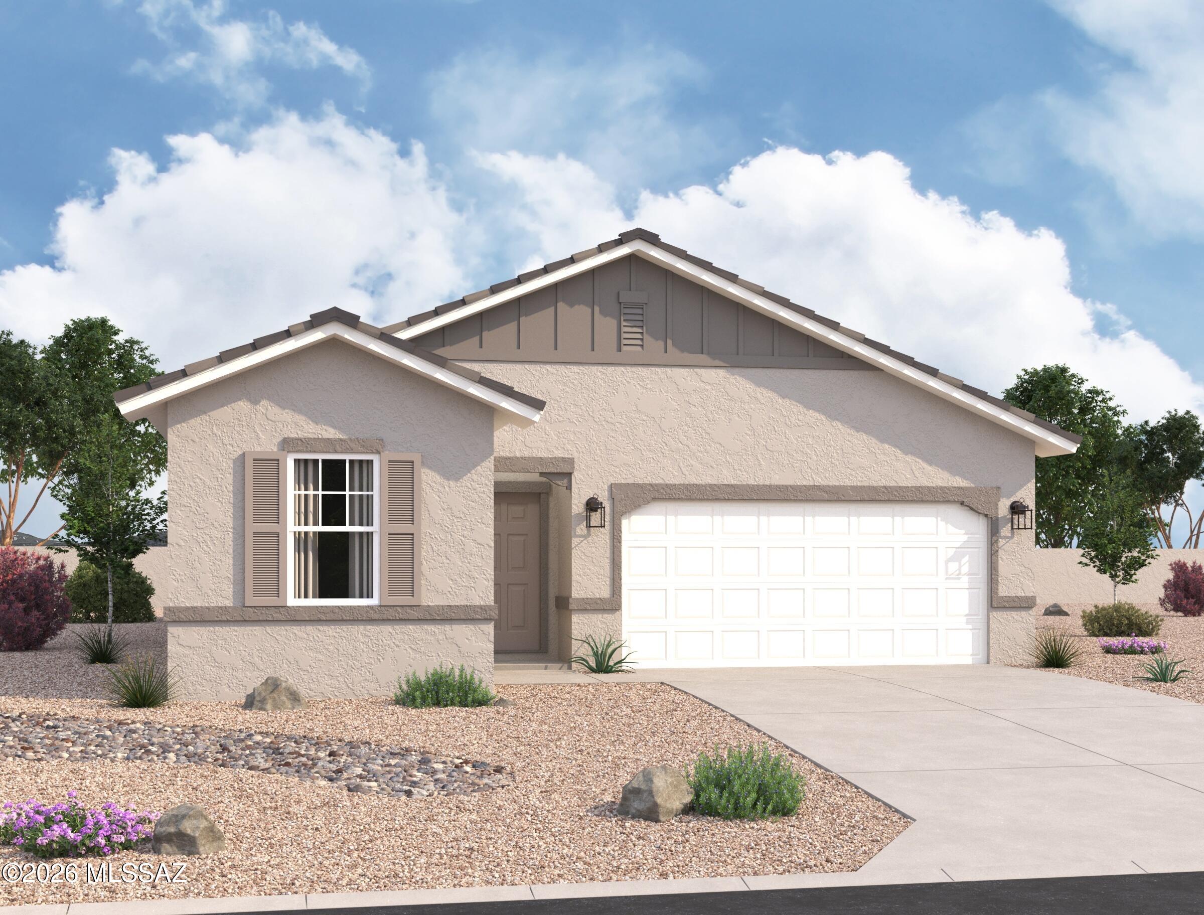 Our awesome Moonbeam plan sits right across from the park area with great views and beautiful sunsets!  3 Bedrooms and 2 Baths make this home a charmer!  Large island in the kitchen and lots of entertaining space too!   Beautiful, brand-new homes featuring thoughtfully designed floorplans in the scenic Tucson community of Star Valley! Conveniently located with easy access to I-19 and major Tucson destinations, this community offers the perfect balance of comfort, convenience, and outdoor living. Homes showcase desirable upgrades including 9' ceilings, white shaker cabinets, Shaw 17'' x 17'' tile flooring, and granite kitchen countertops. Each home comes move-in ready with stainless steel kitchen appliances, including a refrigerator, washer, and dryer. Energy-efficient features include Low- dual-pane windows and a Wi-Fi programmable thermostat to help maximize comfort and savings. Exterior highlights include front yard desert landscaping with irrigation, covered patios, and spacious backyards designed for enjoying Tucson's beautiful sunsets. Residents enjoy community amenities including large park with soccer fields; walking paths and natural trails; children's play area; basketball courts; tennis courts; pickleball courts; natural-area dog park and incredible mountain views everywhere! This welcoming community offers the perfect combination of modern living and the natural beauty of the Tucson desert.