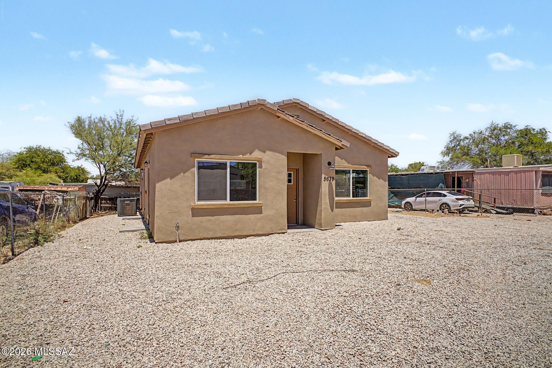 NEW CONSTRUCTION! Be the first to live in  this lovely single-story home in Tucson! Discover the bright and inviting living spaces designed with comfort in mind, featuring tile flooring, plenty of natural light, and neutral paint that pairs well with any decor, offering plenty of potential to easily make your own. Prepare feasts and quick meals in the pristine kitchen, displaying recessed lighting, white shaker-style cabinets, and sleek granite countertops. Relax after a long day in the main retreat, complete with a full ensuite for added convenience. The backyard features ample space for outdoor activities with an easy-maintenance landscape so you can always be worry-free!  Convenient location close to restaurants and shopping. Don't miss out on this one! Agent/Owner
