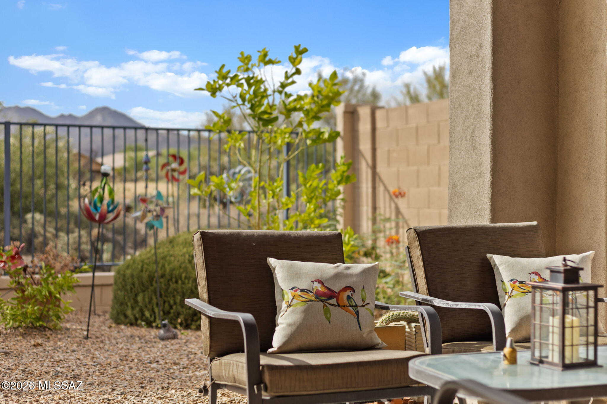 Better Than New in Oro Valley with Resort-Style Living at Its Finest! Welcome to this beautiful 2017 built single-story home located in the Gated community of Center Pointe Vistoso, one of Oro Valley's most sought-after neighborhoods. This 2,020 sq. ft. residence offers 3 bedrooms, 3 bathrooms, and a LARGE den/flex room that could easily serve as a 4th bedroom, home office, or media room.     Designed for both comfort and entertaining, the home features a gourmet kitchen with a large island, granite countertops, upgraded cabinetry, designer backsplash, gas cooktop. Additional upgrades include an expansive 16-foot sliding glass door, a coffered foyer ceiling, two-tone interior paint, and a luxurious primary suite with a large walk-in shower. The backyard backs to natural desert open space, providing privacy, mountain views, and a peaceful Arizona setting and covered patio for outdoor living space.       Walking distance to the Resort style Clubhouse, offering amenities not found anywhere else in NW Tucson! A stunning 6,000-square-foot clubhouse with a large, 25-meter long and oversized massive resort-style pool, in-ground spa, splash pad, private event room with indoor and outdoor kitchen and BBQ area, fireplace lounge, shaded ramadas, picnic areas, playgrounds, parks, and walking trails.        Outdoor enthusiasts will love the direct access to the 6.2-mile paved Vistoso Trail, as well as nearby connections to The Loop, the 135-mile walking or biking trail system. Residents also enjoy access to nine additional parks throughout Rancho Vistoso, creating endless opportunities for recreation and outdoor enjoyment.        Conveniently located near Golf courses, shopping, dining, schools, Oro Valley Hospital, Catalina State Park, Big Wash Trailhead, Hone Bee Canyon, and Oro Valley Marketplace, this home offers the perfect combination of luxury, convenience, and an active lifestyle.        If you've been searching for a newer home with mountain views, privacy, and resort-style community amenities that are virtually unmatched in NW Tucson, this is a rare opportunity you won't want to miss.